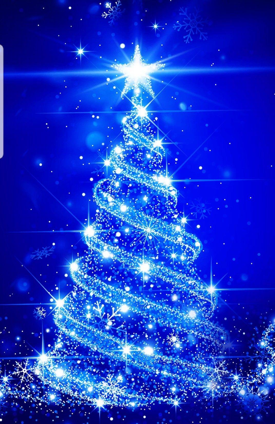 1071x1647 Blue lit Christmas tree similar to another one. This needs to be trimmed a tiny bit. Christmas tree wallpaper, Merry christmas image, Christmas card background