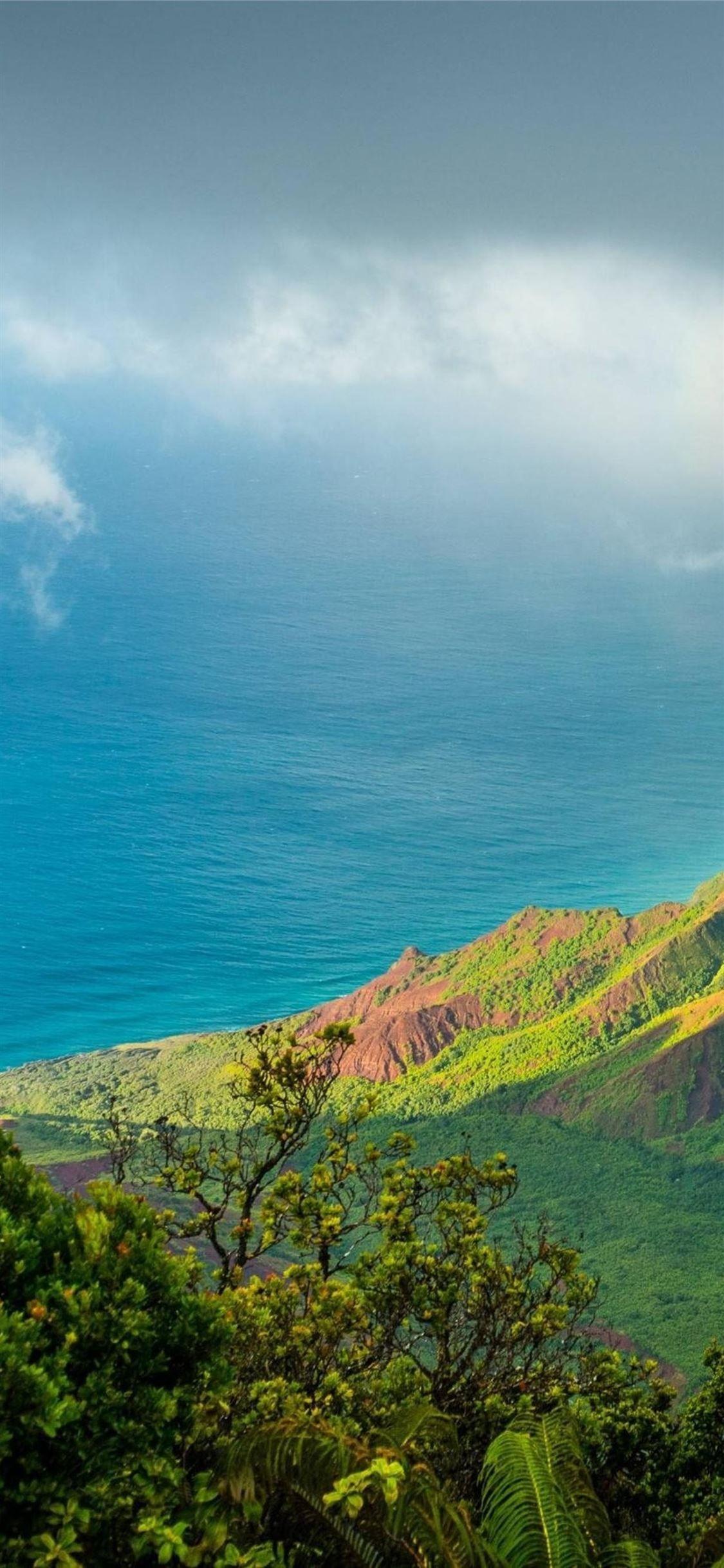 1125x2436 Hawaii Kauai Pacific Ocean Clouds Mountains 4k Son. #Kauai mostbeautifulplacestovisit #hawaii #UnitedStates #iP. HD nature wallpaper, Hawaii beaches, Kauai