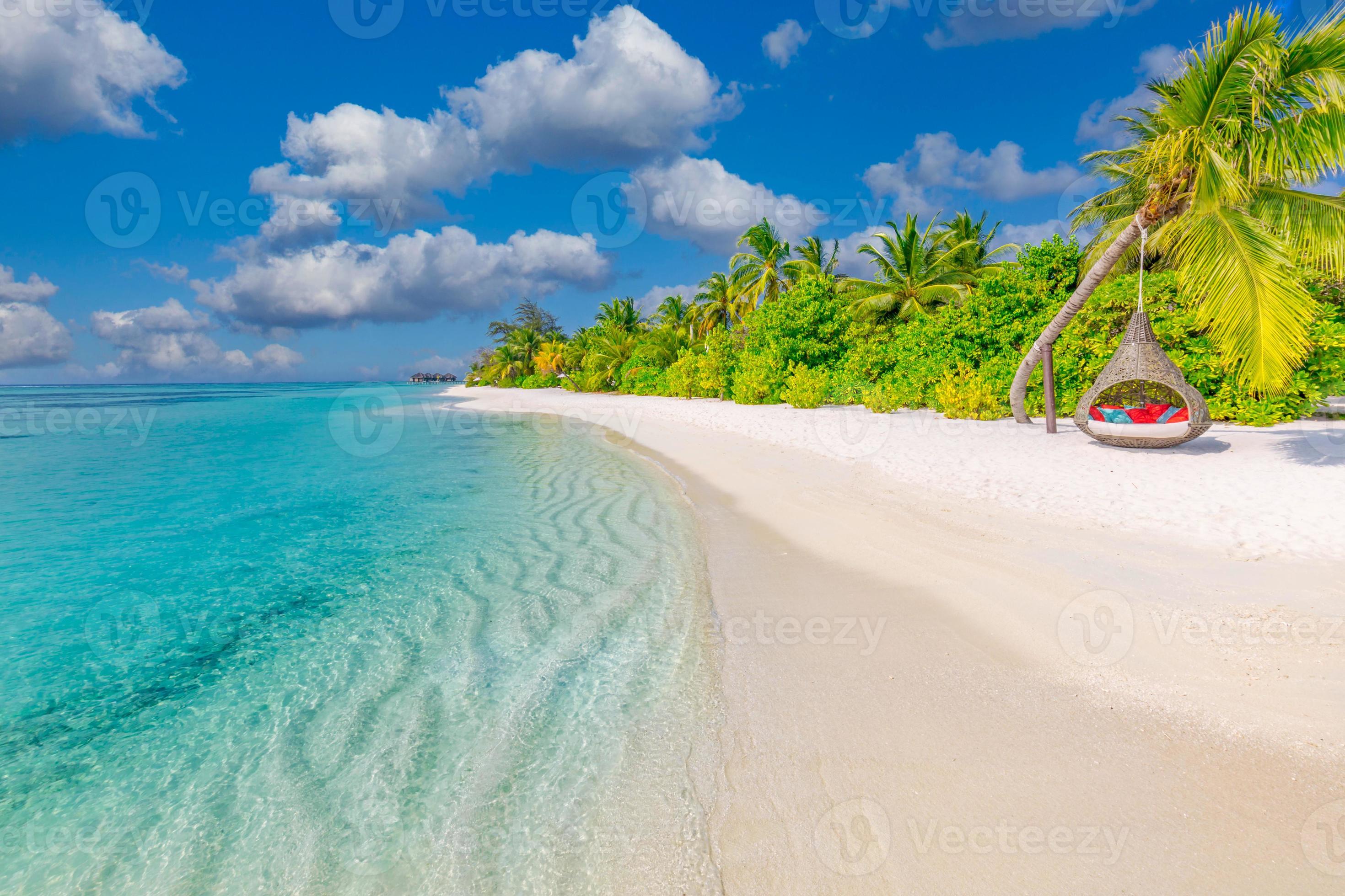 2940x1960 Tropical beach background as summer landscape with beach swing or hammock and white sand and calm sea for beach banner. Perfect beach scene vacation and summer holiday concept. Boost up color process