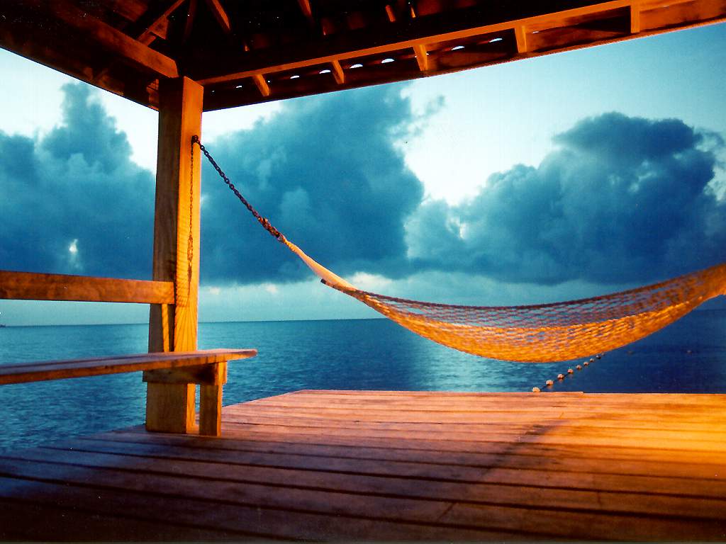 1024x768 Swing On The Beach Wallpaper