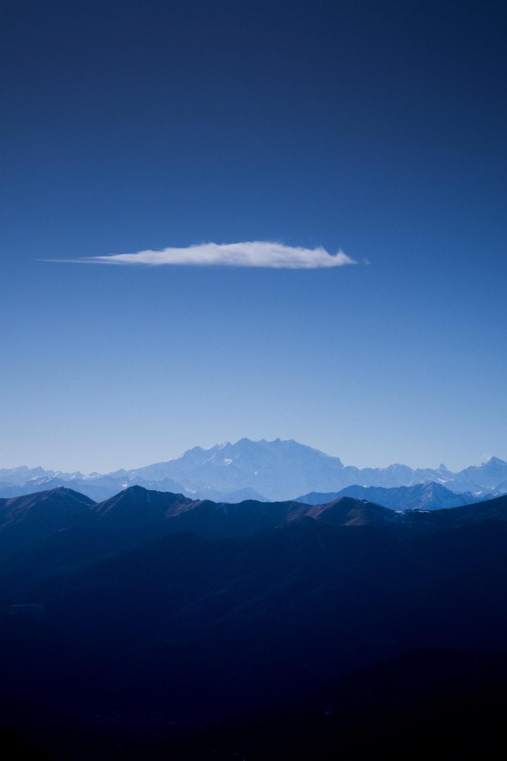1000x1500 High Angle Photography Of Mountains And Clouds Photo