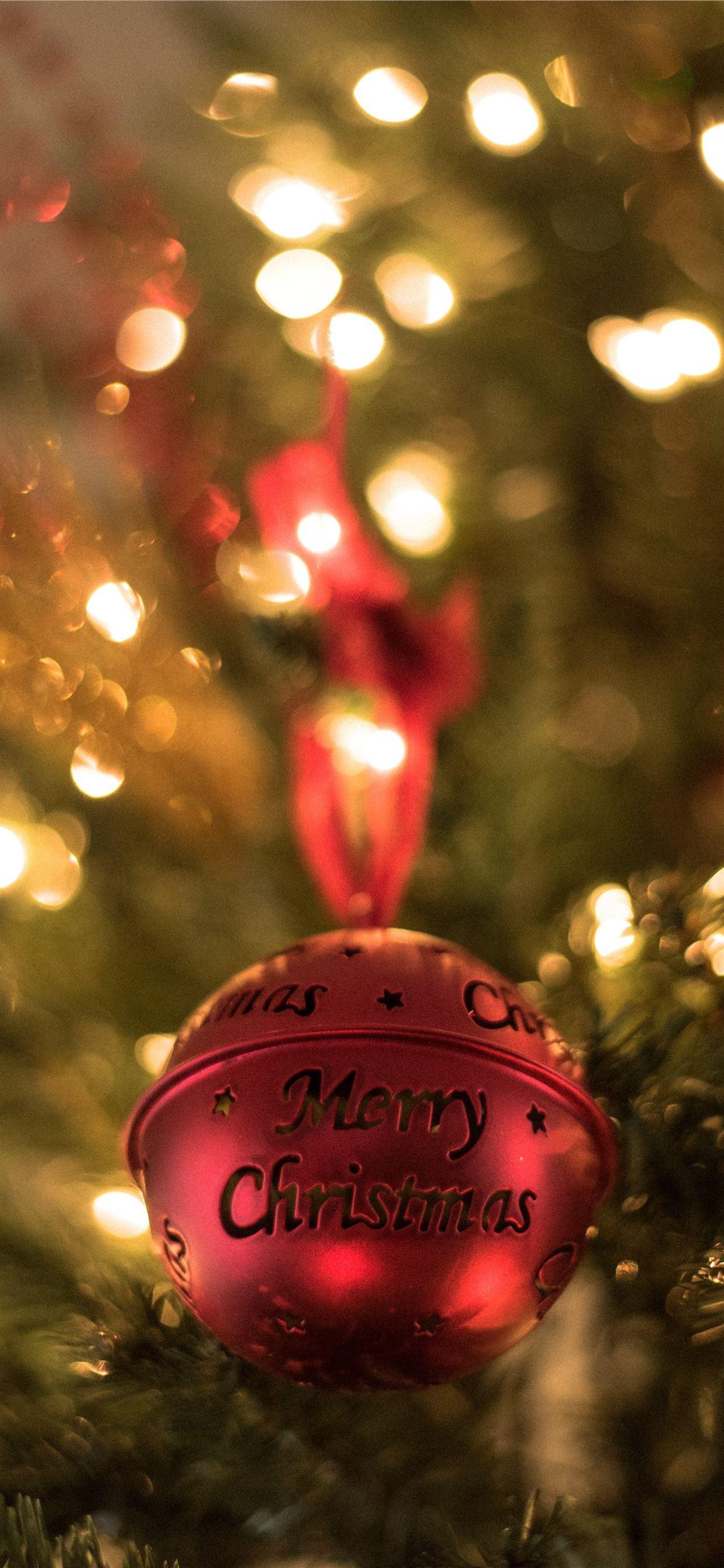 1242x2688 red Christmas bell on Christmas tree iPhone 11 Wallpaper Free Download