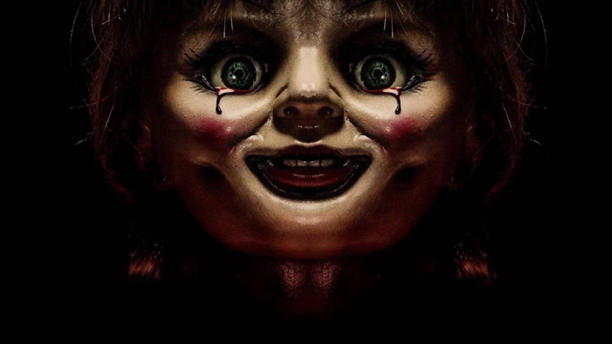 2000x1125 Download Closed Up Annabelle Cursed Doll Wallpaper