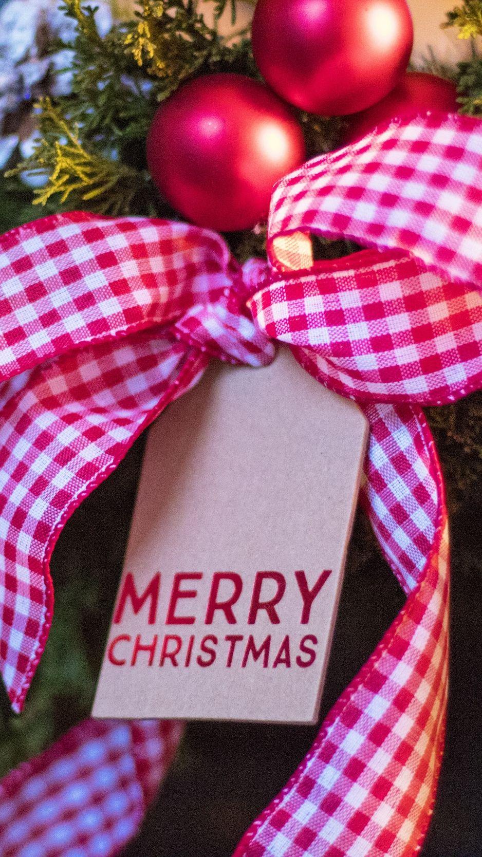 938x1668 Download wallpaper 938x1668 christmas, christmas tree toy, bow, new