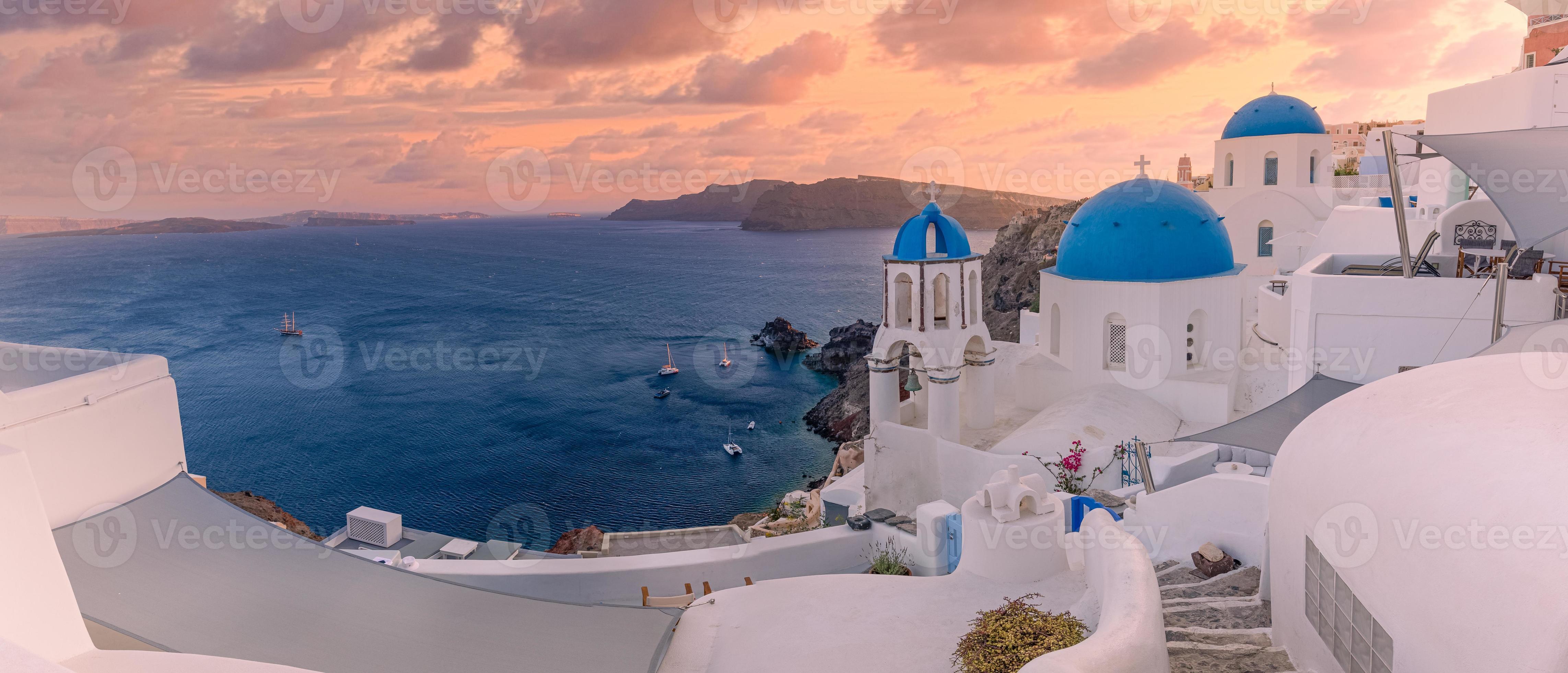 4570x1960 Amazing evening view of Santorini island. Pictureque spring sunset on the famous Oia, Greece, Europe. Traveling concept background. Summer vacation destination
