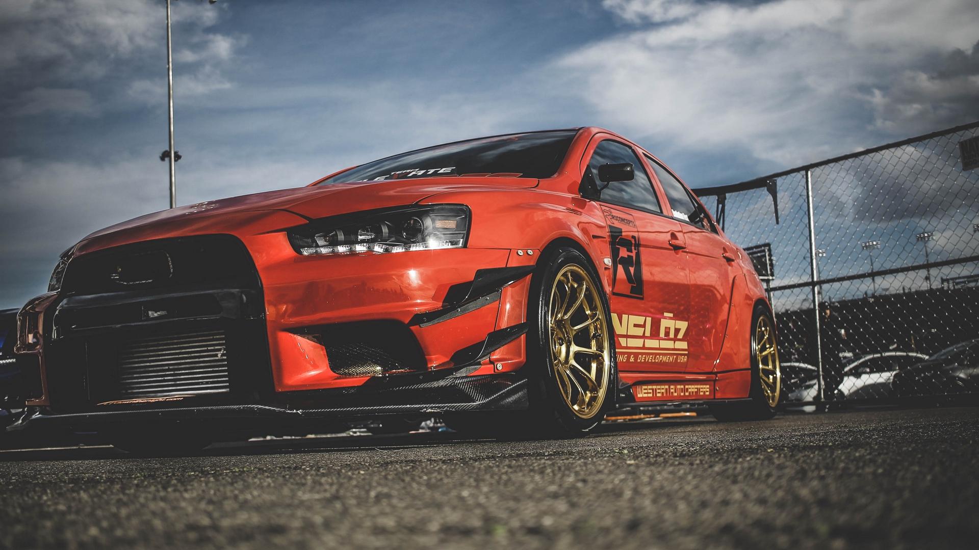 1920x1080 Mitsubishi Mitsubishi Lancer Evo X Sports Car Red Cars Car Vehicle Low Angle Colored Wheels Wallpaper:1920x1080