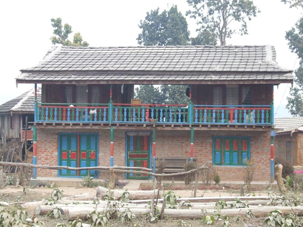 1024x768 Nepali village house. On the road in Nepal