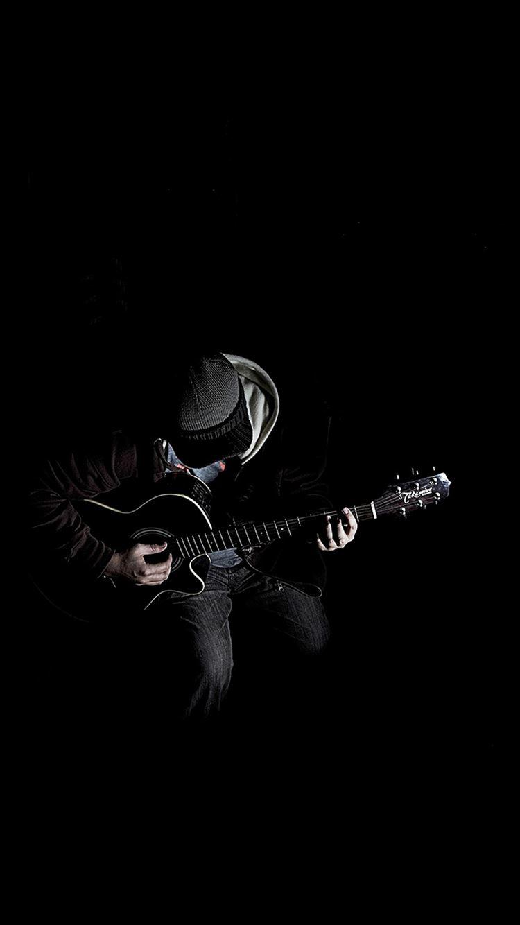 750x1334 Out The Dark Guitar Player Music iPhone 8 Wallpaper Free Download