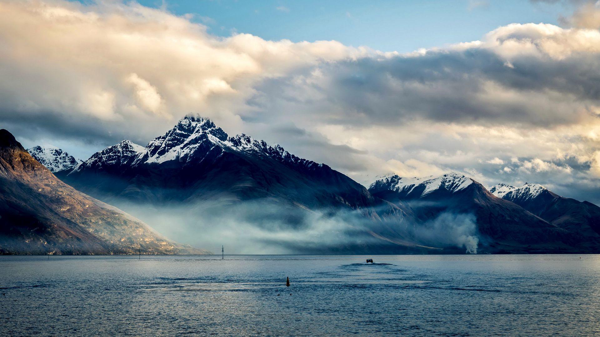 1920x1080 Download wallpaper 1920x1080 new zealand, sea, mountains, sky, clouds full hd, hdtv, fhd, 1080p HD background