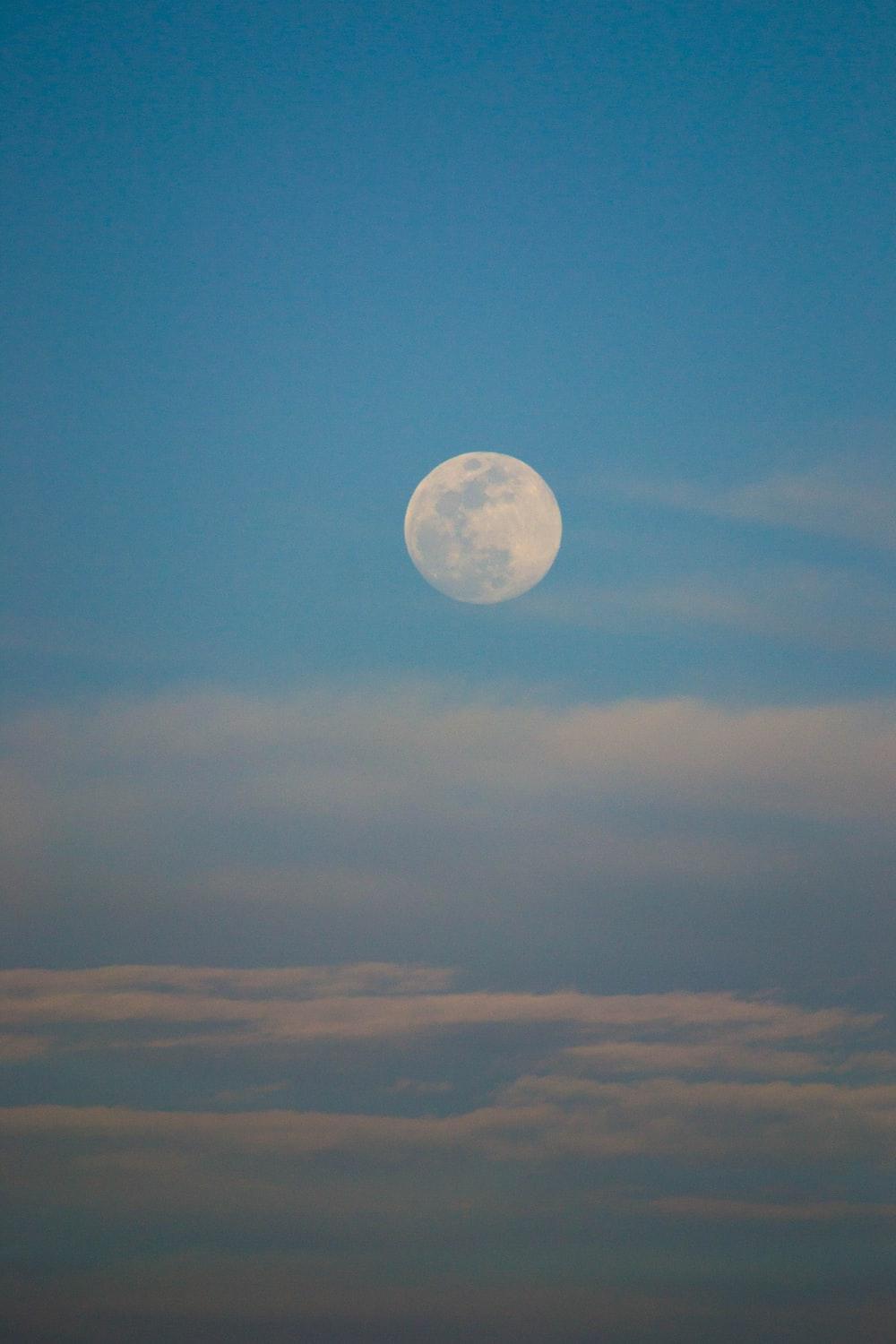 1000x1500 moon during sunset photo