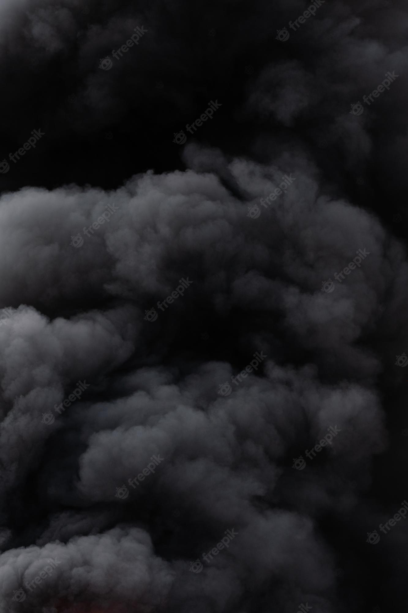 1333x2000 Premium Photo. Background of black color clouds covered sky during strong fire blurred motion and smooth dangerous