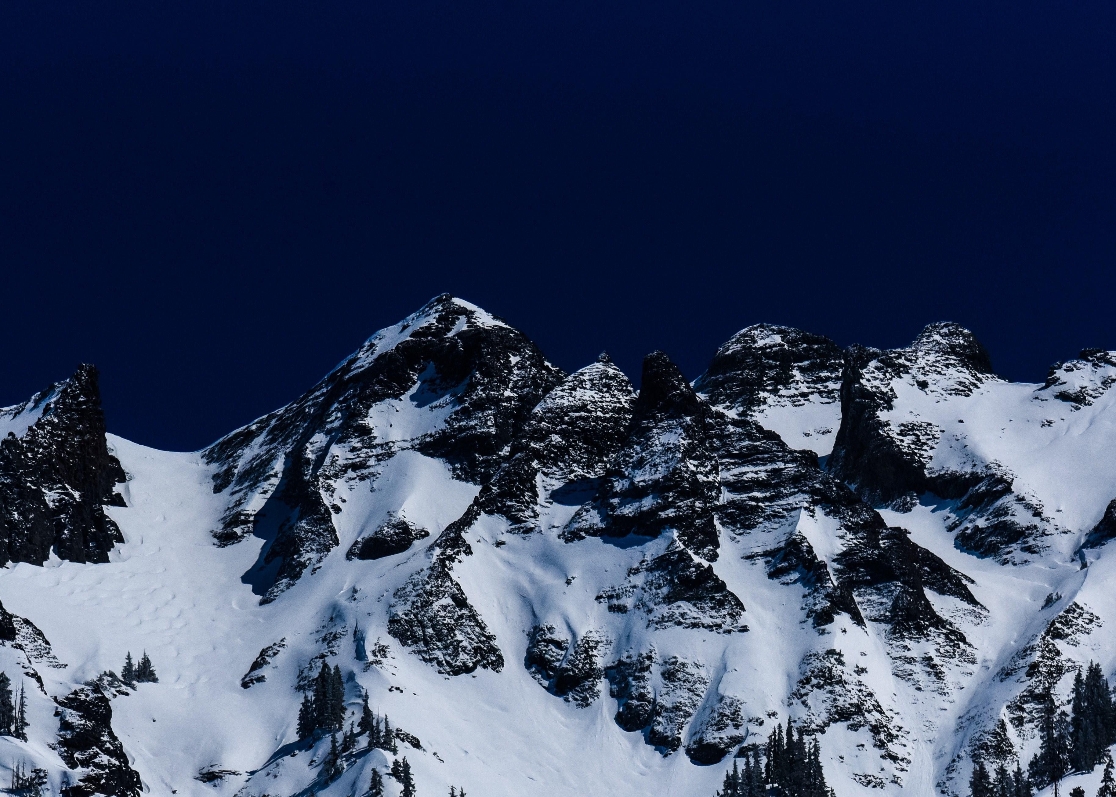 3656x2611 Wallpaper / a snowy mountains crest against a dark sky in ouray, mountain crest at night 4k wallpaper free download