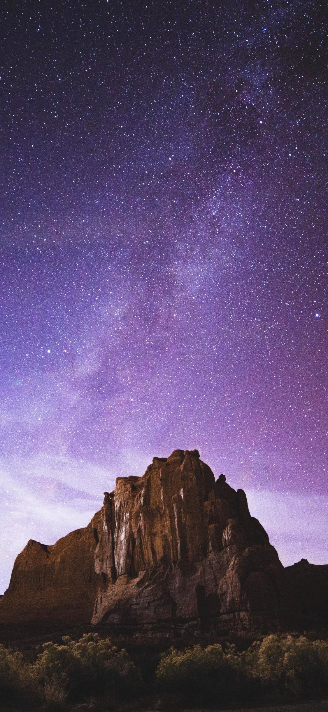 1125x2436 Download rocks, milky way, desert, purple sky, night 1125x2436 wallpaper, iphone x, 1125x2436 HD image, background, 15885