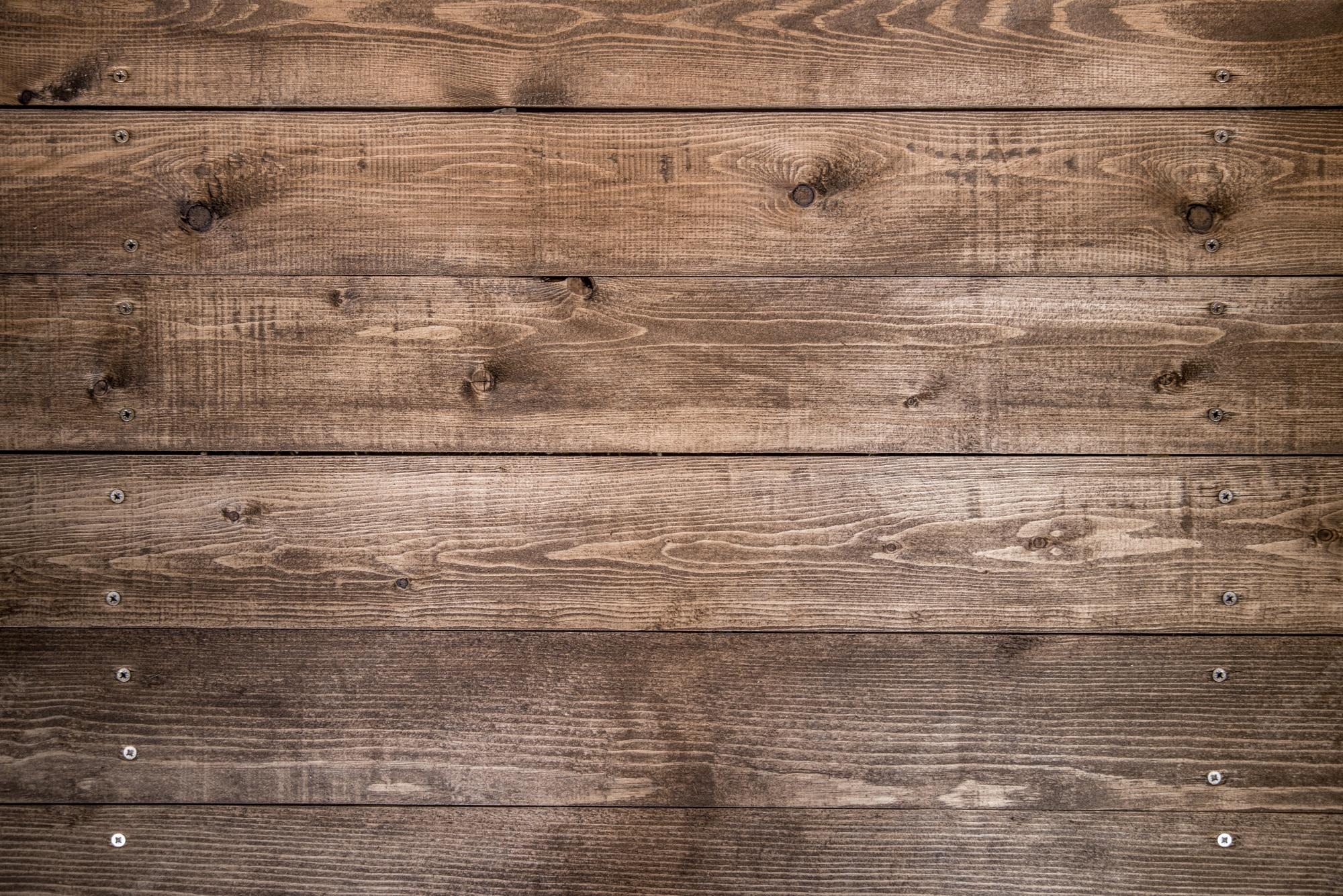 2000x1335 Premium Photo. Old brown wood background made of dark natural wood in grunge style. natural raw planed texture of pine. the surface of table to shoot flat lay. copy space