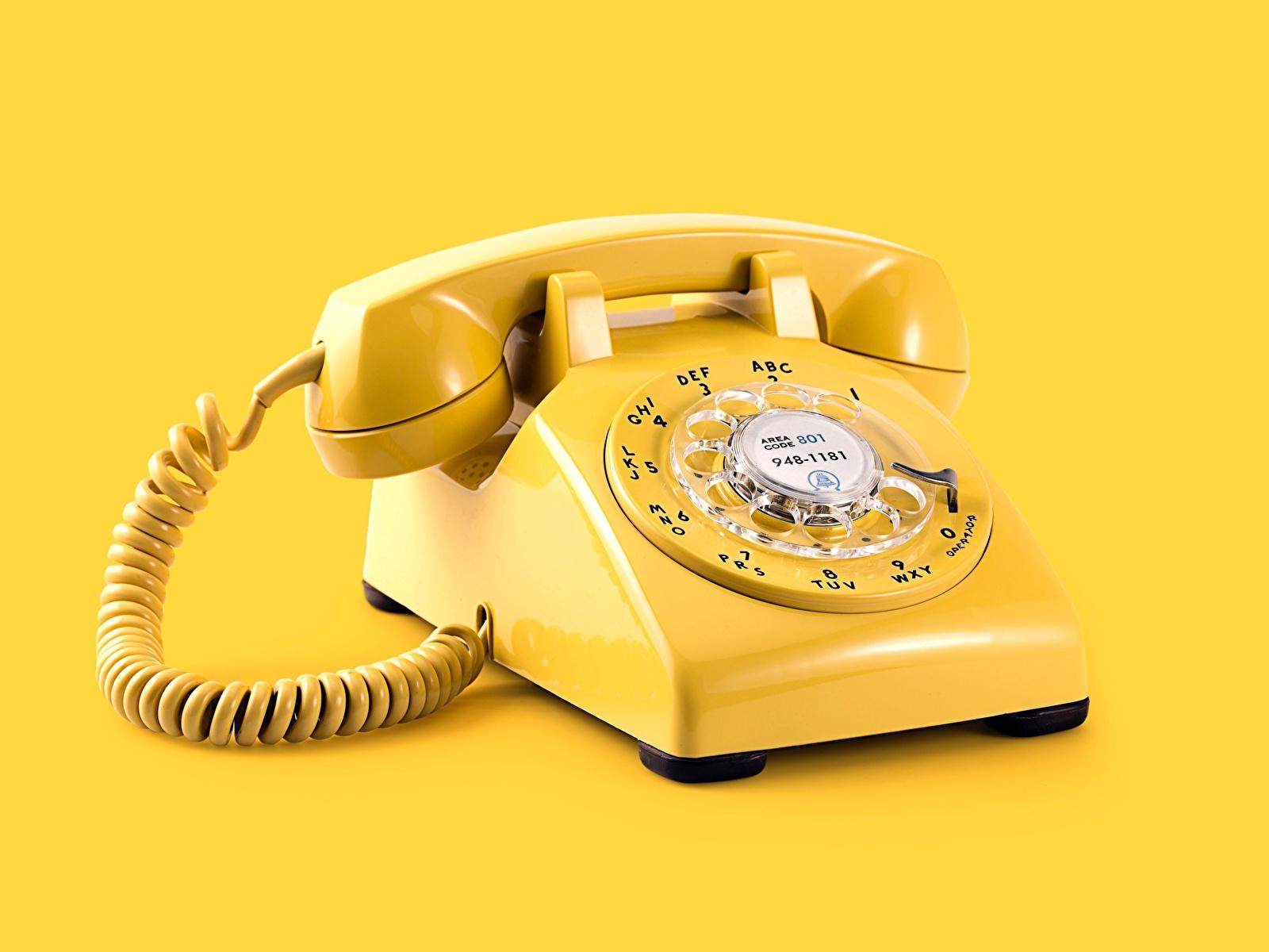 1600x1200 image Yellow vintage Telephone Colored background 1600x1200