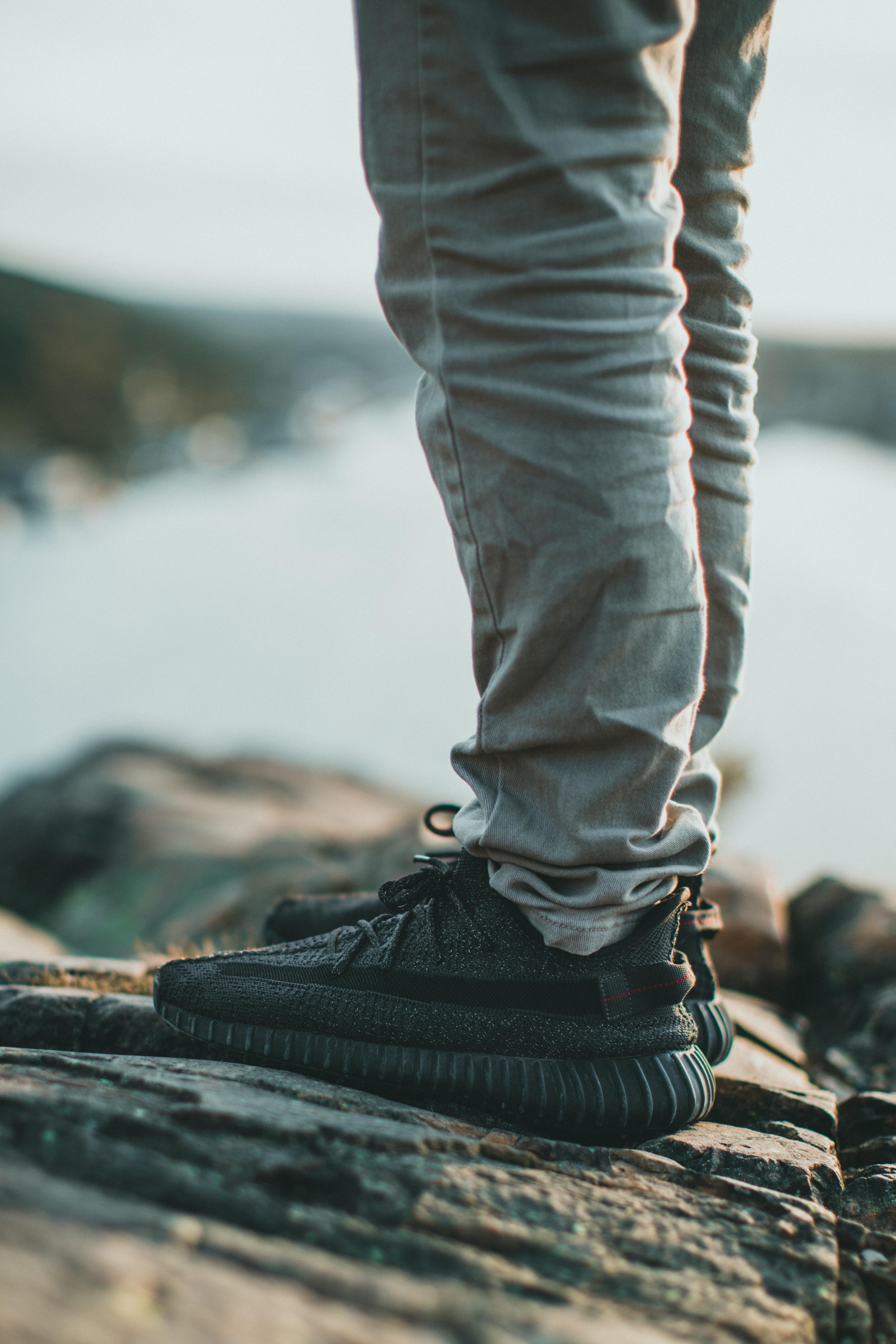 3499x5249 Person Wearing Adidas Yeezy Boost Shoes · Free