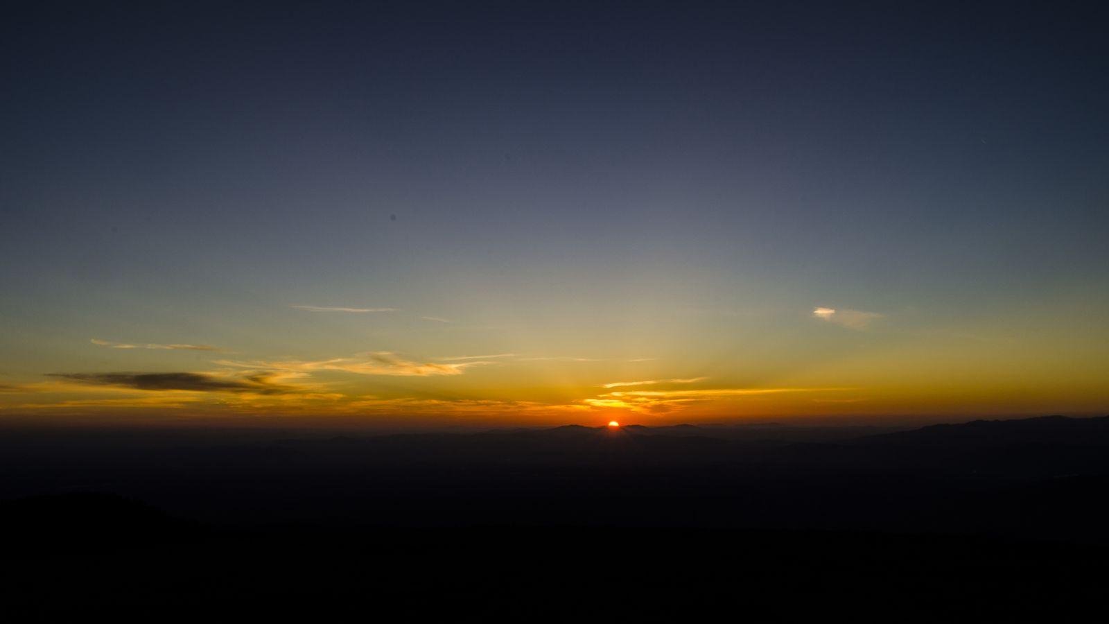 1600x900 Download wallpaper 1600x900 dawn, horizon, mountains, sun, sky, dark, sunrise widescreen 16:9 HD background