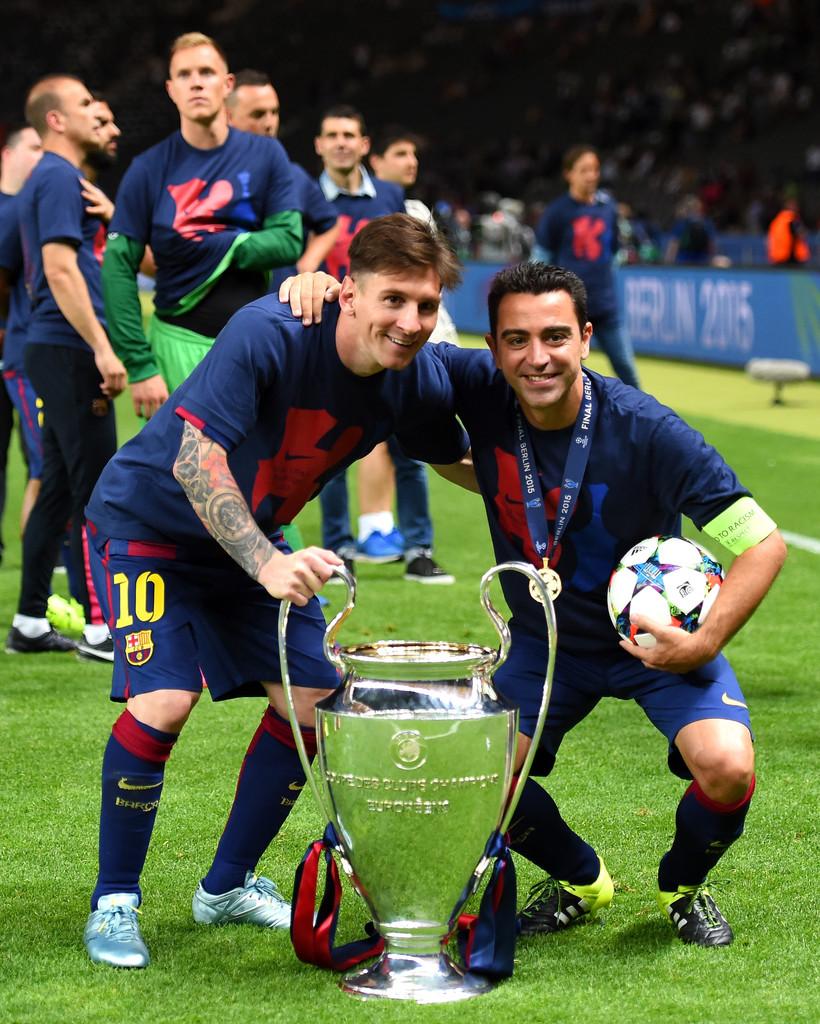 820x1024 Lionel Messi, Xavi Hernandez Messi and Xavi Hernandez Photo