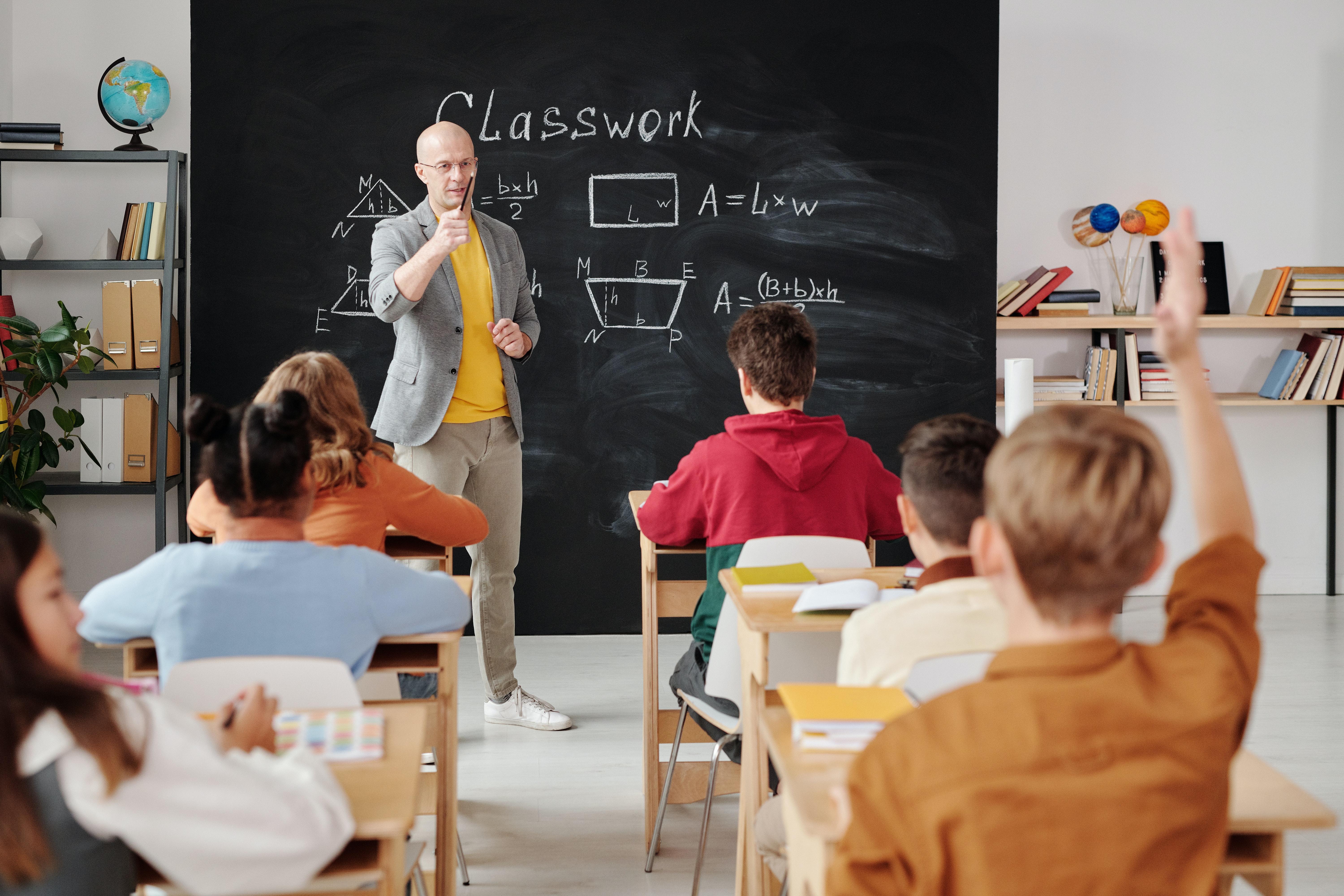 6000x4000 Teacher Asking a Question to the Class · Free