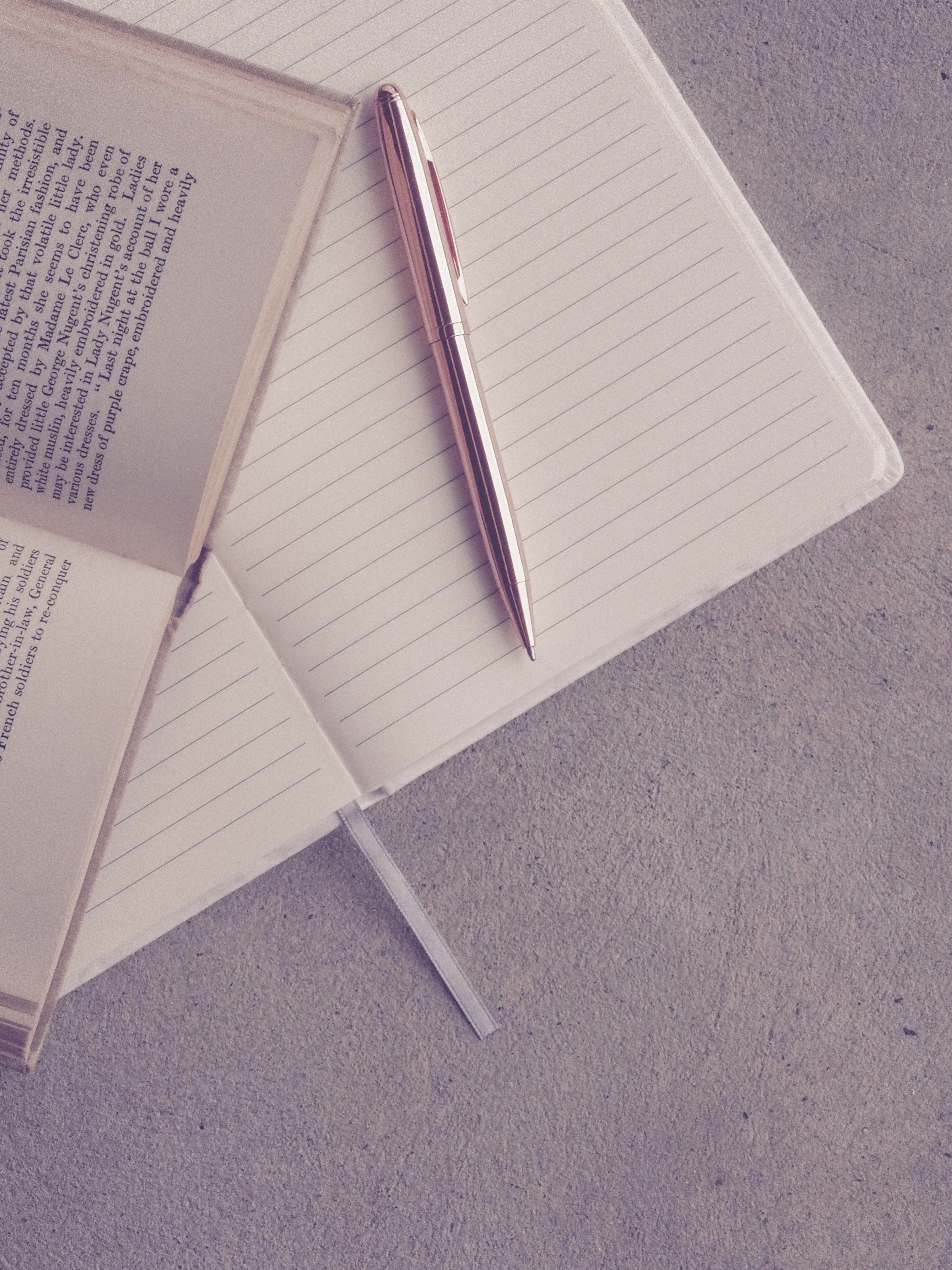3456x4608 Book and Pen on Notebook · Free