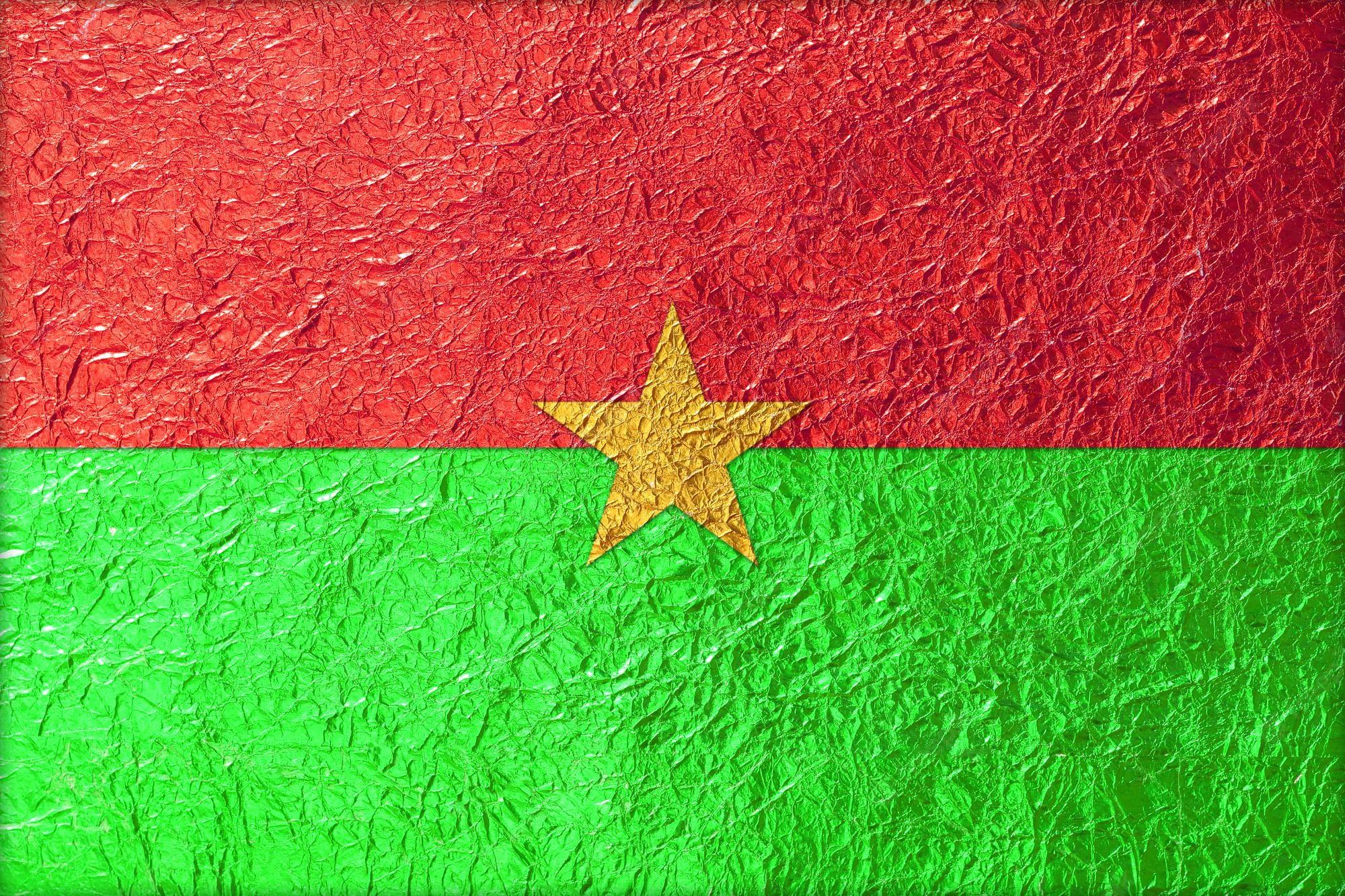 2000x1333 Premium Photo. Burkina faso flag with a shiny leaf bronze shiny leaf foil texture background
