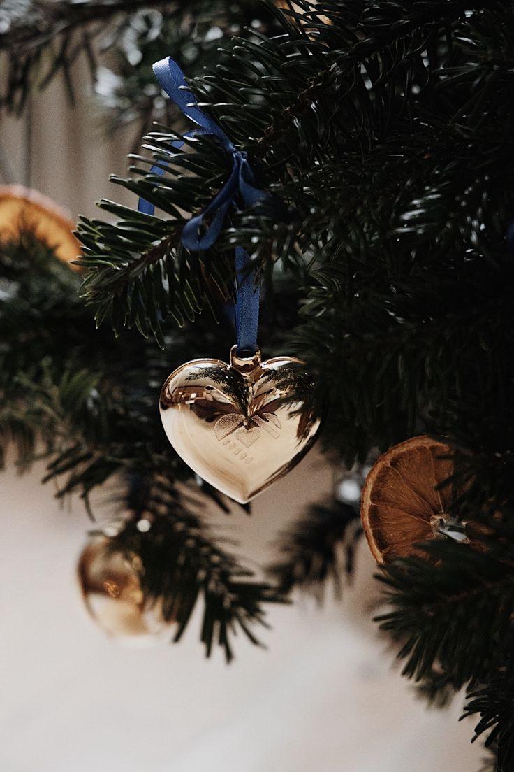 736x1104 Building a Holiday Tradition with Georg Jensen Christmas Ornaments. Holiday traditions, Christmas ornaments, Holiday
