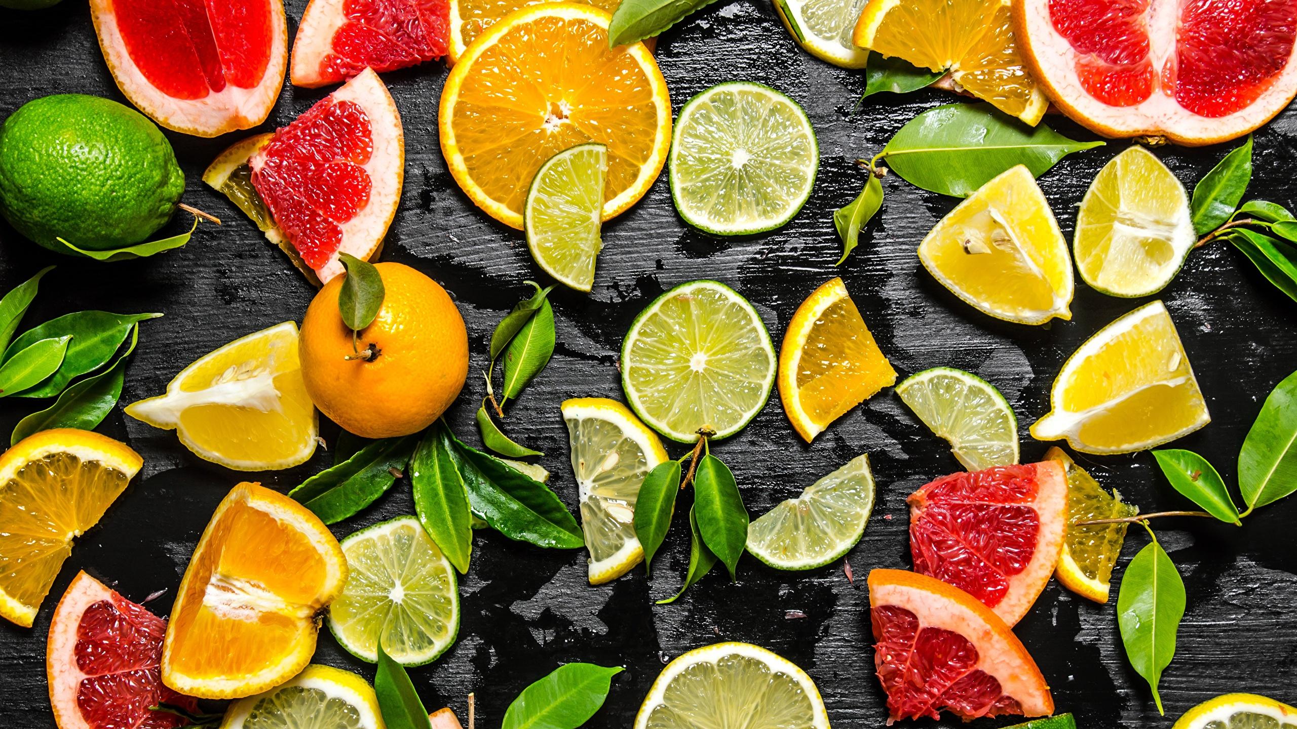 2560x1440 Wallpaper Lime Lemons Food Sliced food Citrus 2560x1440