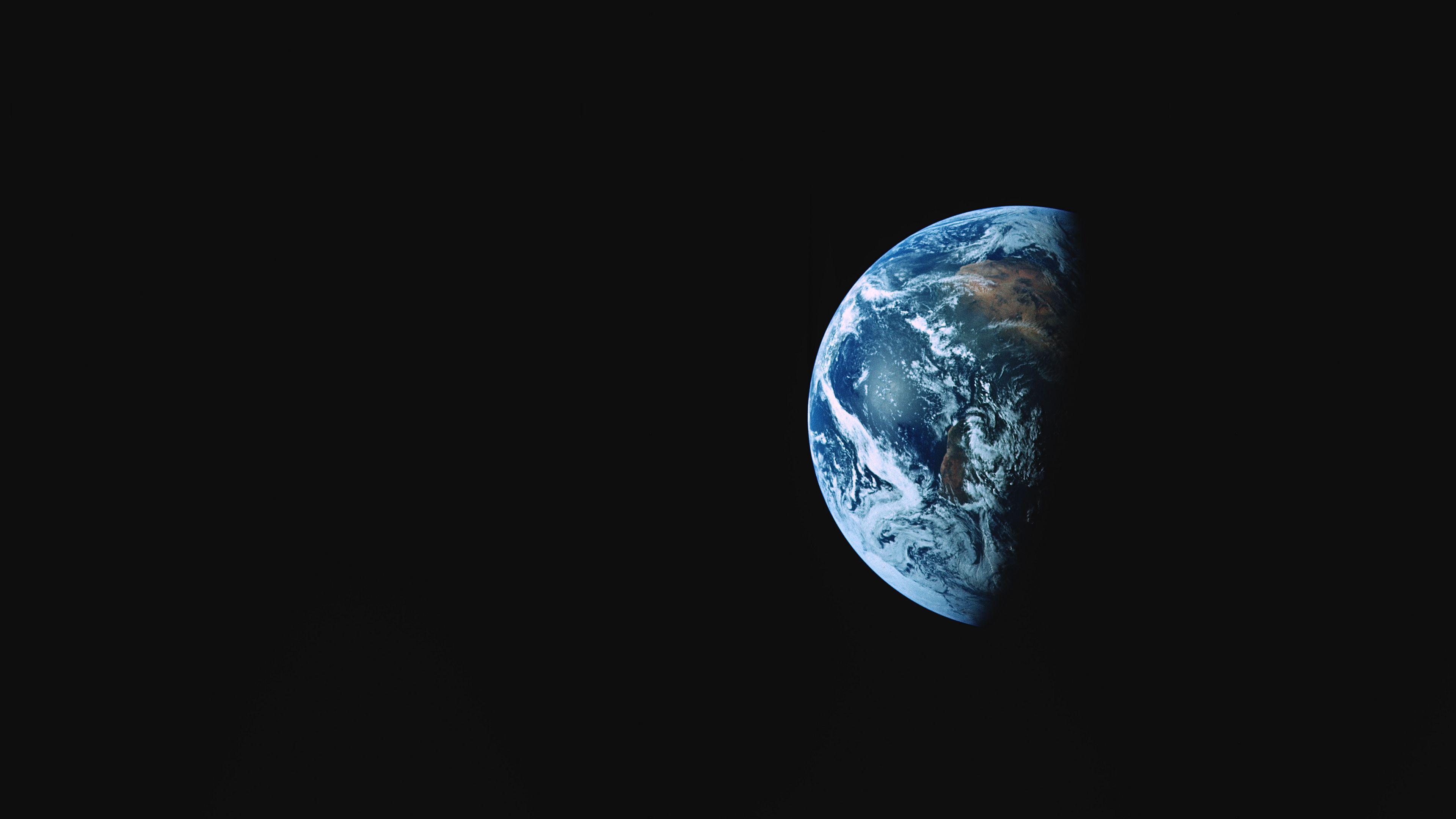 3840x2160 Download wallpaper 3840x2160 earth, planet, shadow, dark, space 4k uhd 16:9 HD background