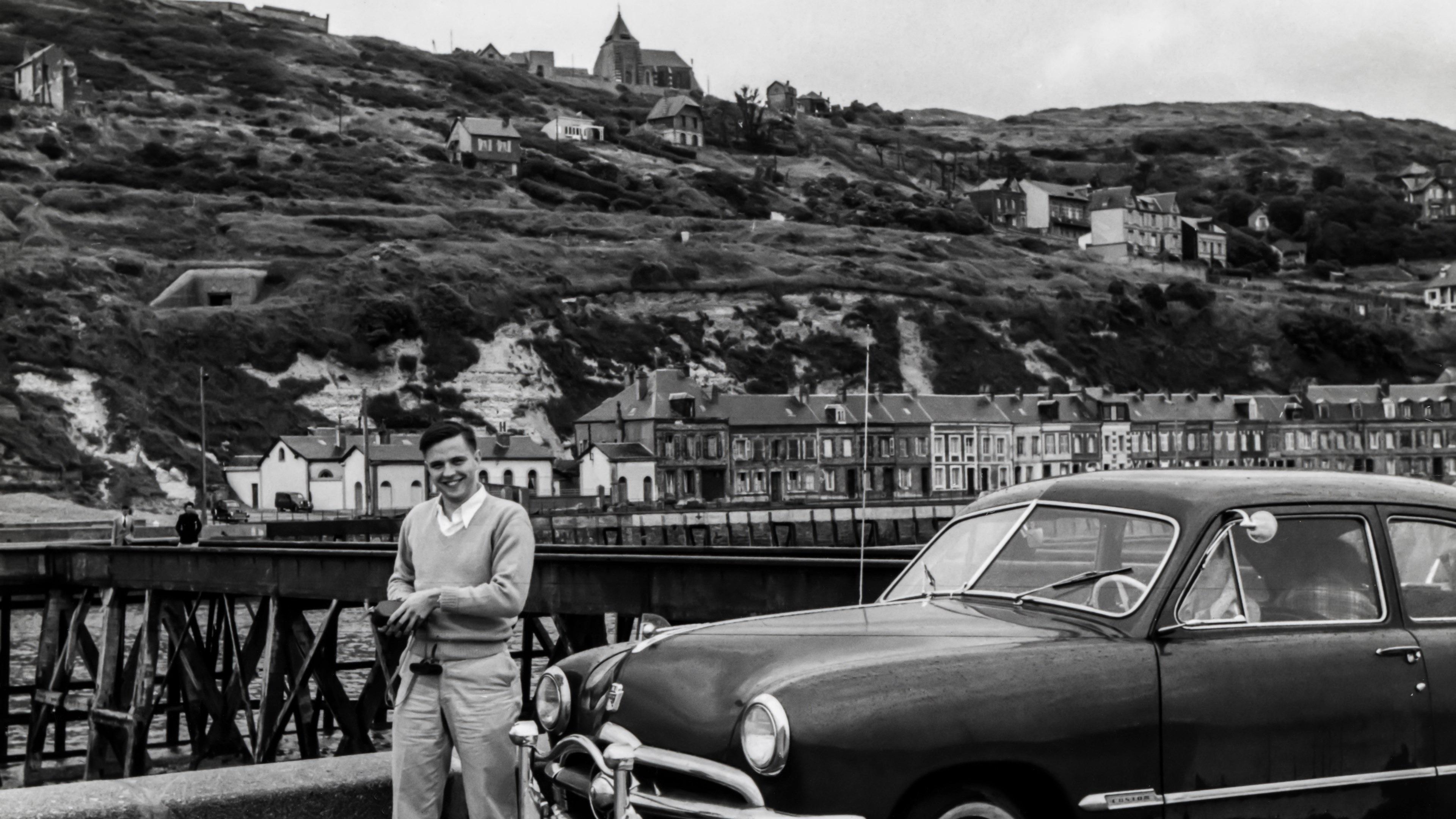 3840x2160 Wallpaper / black and white shot of man in jumper with vintage classic car in village, man village and vintage car 4k wallpaper free download