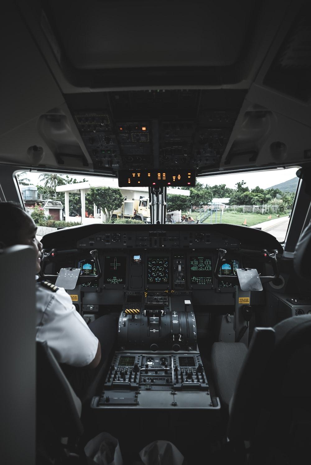 1000x1497 pilot inside operating the aircraft photo