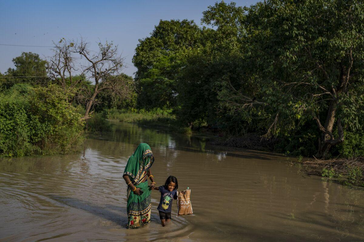 1200x800 AP PHOTOS: In Delhi, Migrants Battered Repeatedly By Floods San Diego Union Tribune