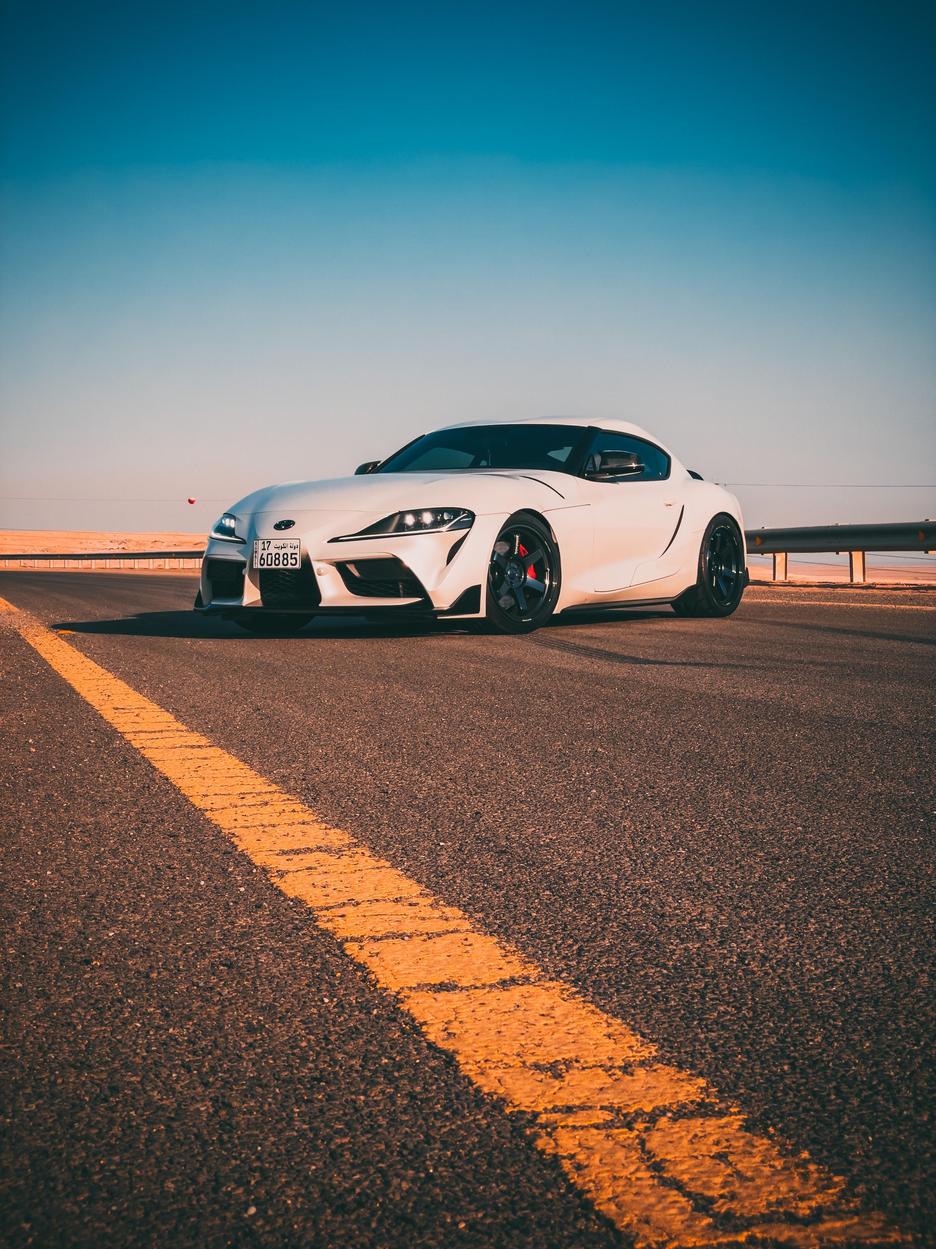 3024x4032 White Toyota Sports Car parked on the Road · Free