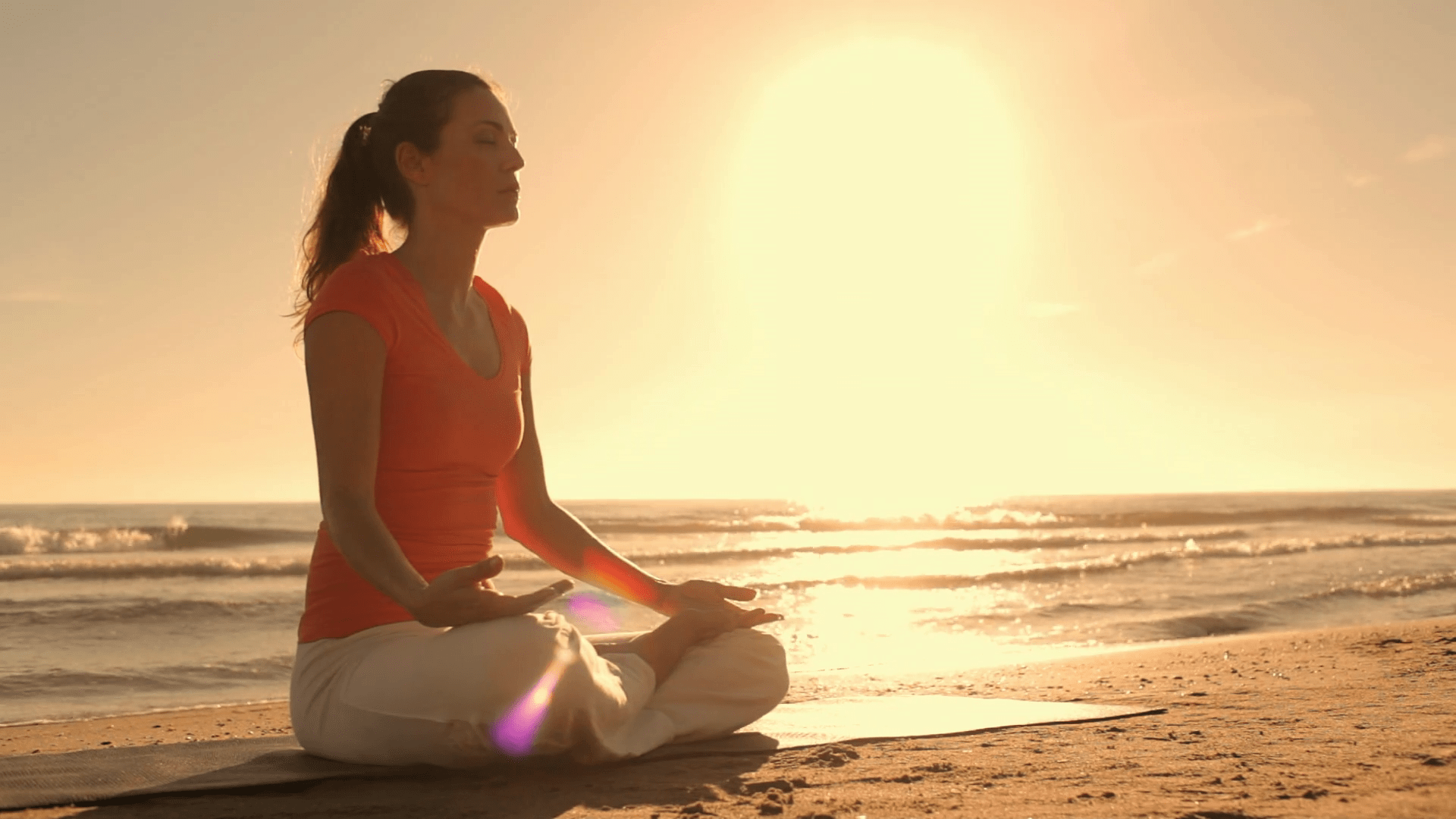 1920x1080 Sunset woman meditating on beach Stock Video Footage