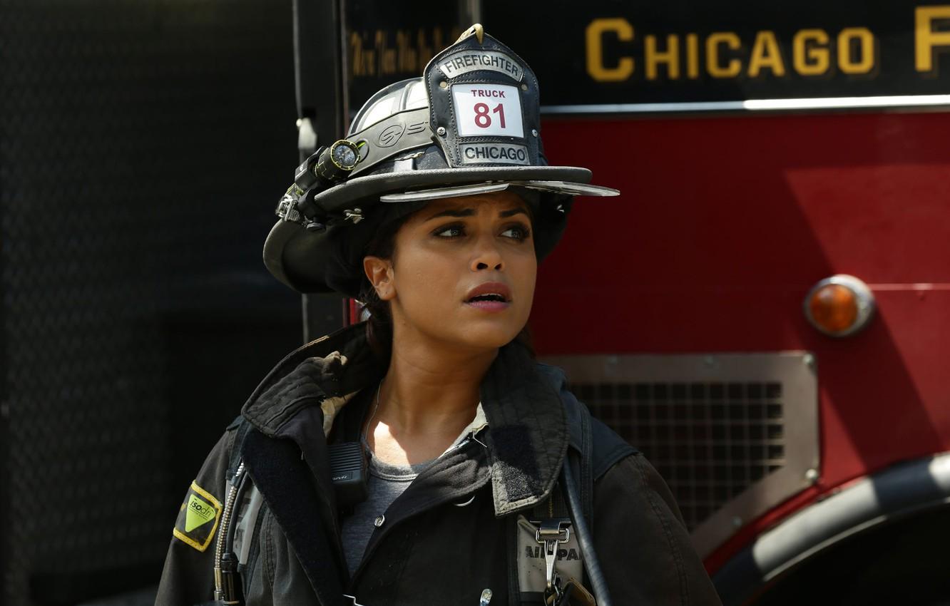 1332x850 Wallpaper look, pose, brunette, helmet, the series, fire truck, Monica Raymund, Monica Raymund, Chicago Fire, Chicago Fire, Gabriela Dawson image for desktop, section фильмы
