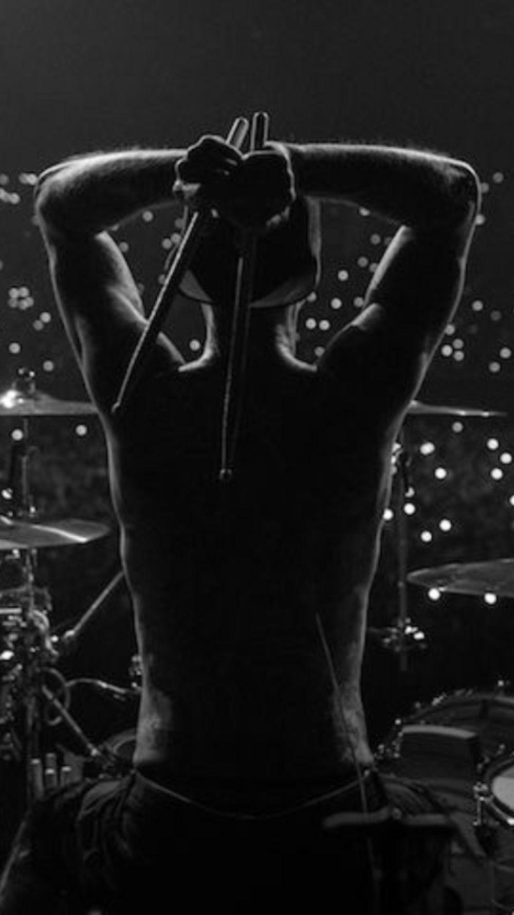 1000x1778 Cellphone Wallpaper: Drummer in Black. Band photohoot, Drummer, Musician photography