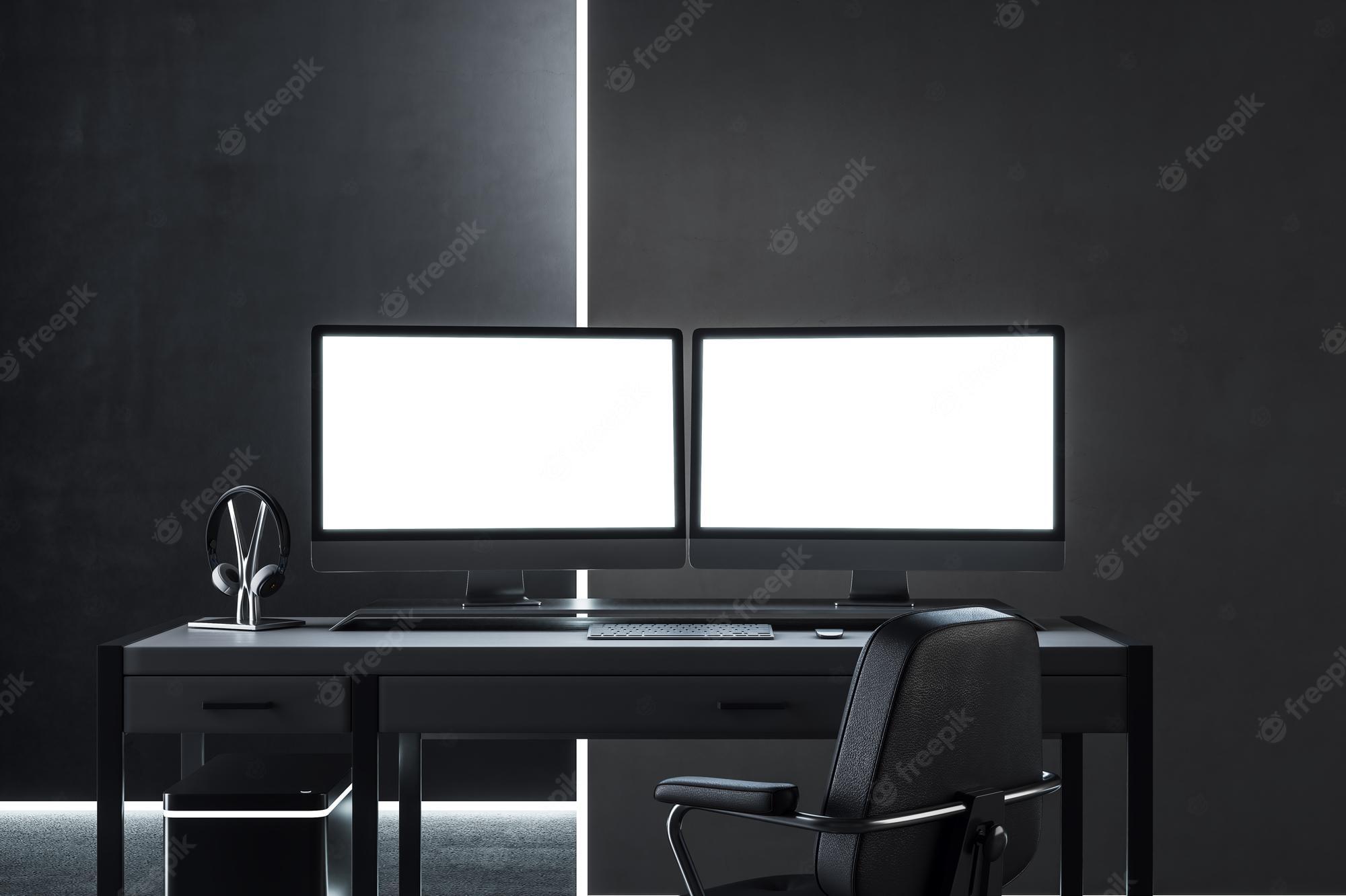 2000x1333 Premium Photo. Total black concept with two blank white monitor screens with place for your logo or text on black office table on dark wall background 3D rendering mock up