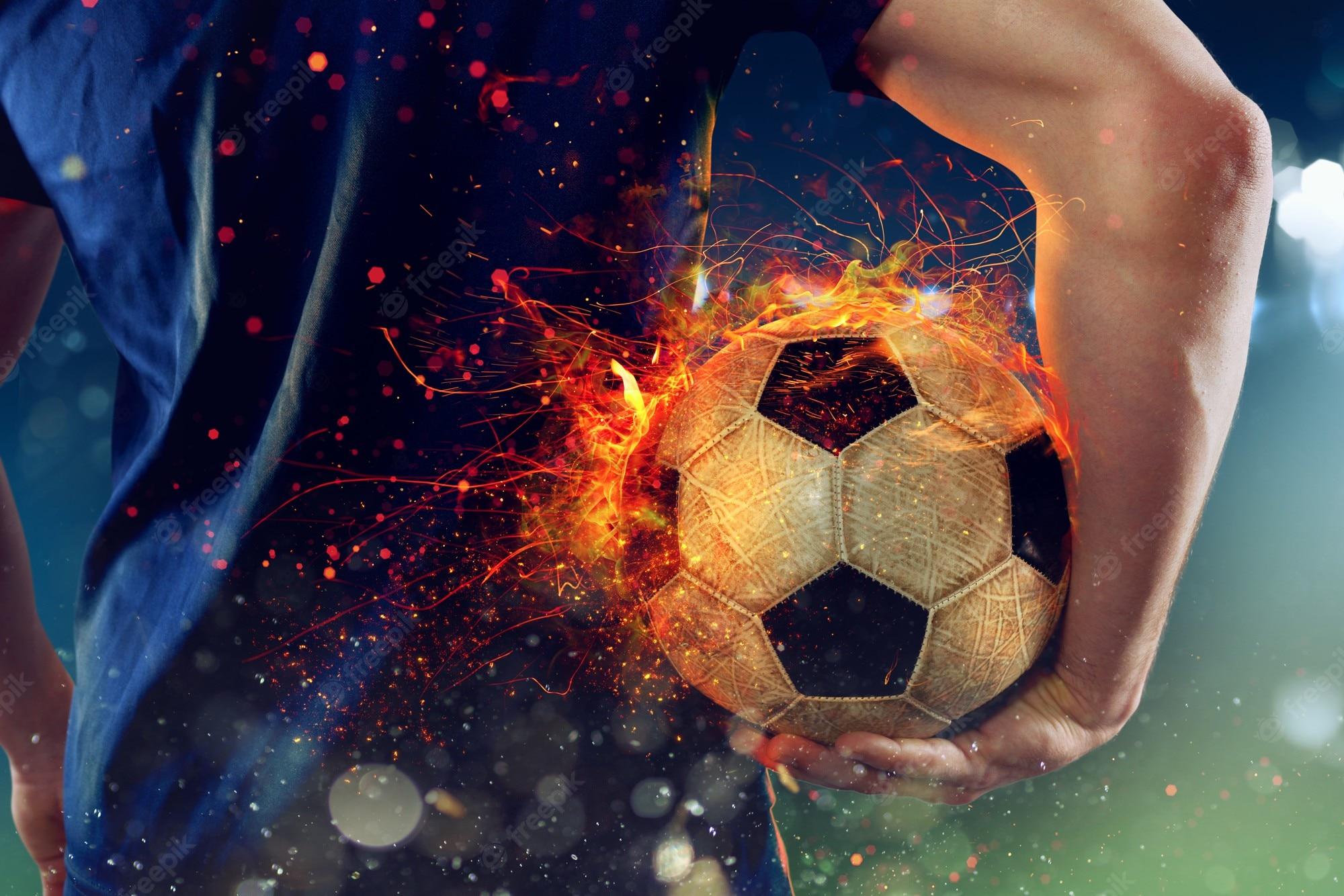 2000x1334 Premium Photo. Soccer player ready to play with fiery soccerball