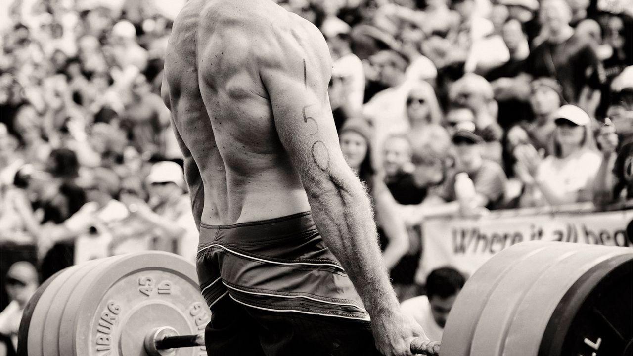 1280x720 Download wallpaper 1280x720 weightlifting, back, sportsman, weight, bar, muscles hd, hdv, 720p HD background