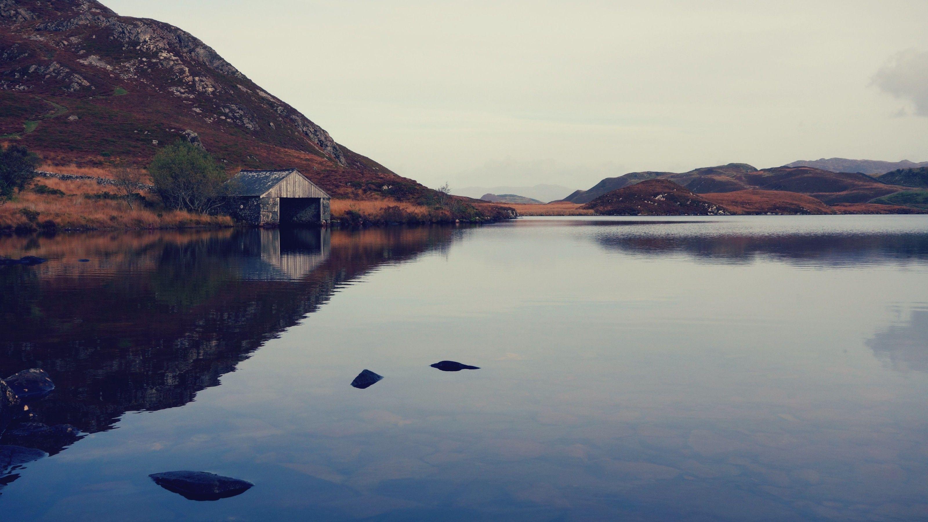 3200x1800 Download 3200x1800 Lake, Hut, Mountain, Rocks Wallpaper