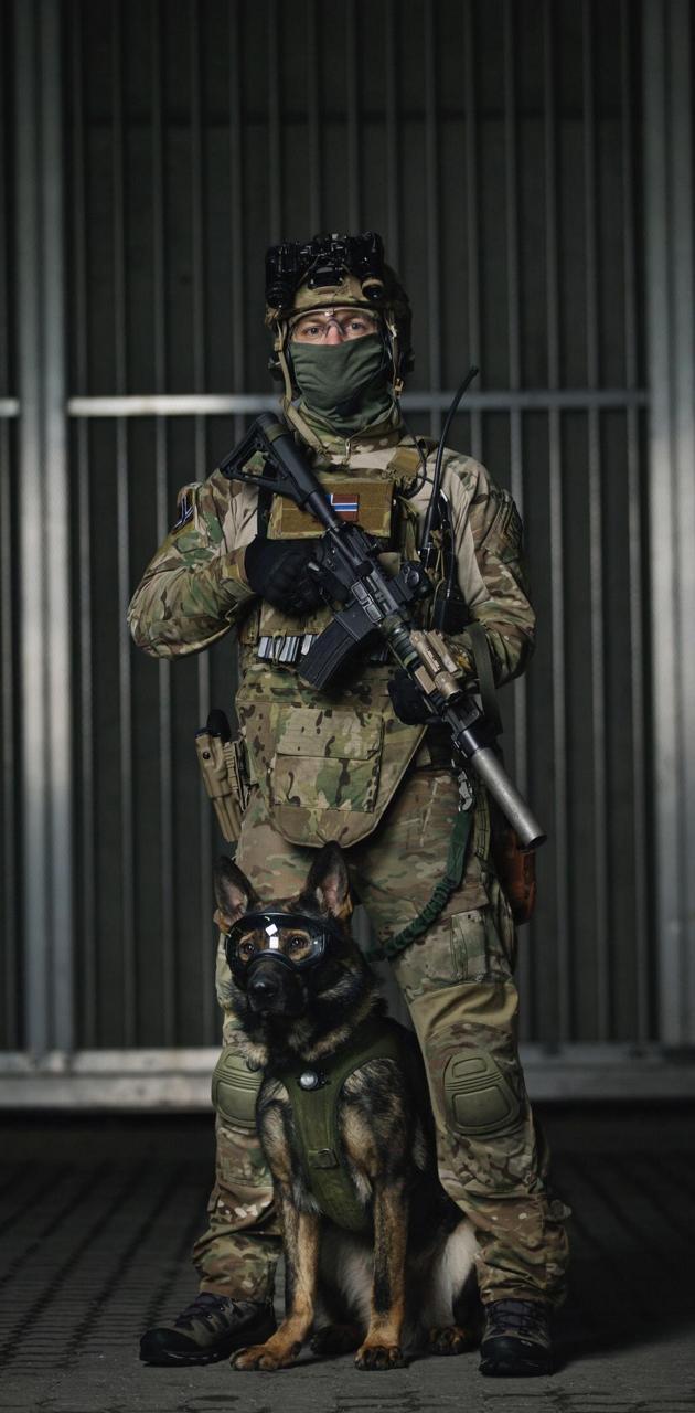 630x1280 soldier and dog wallpaper