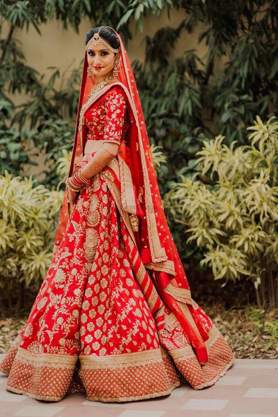 900x1349 Red Sabyasachi Bridal Lehenga