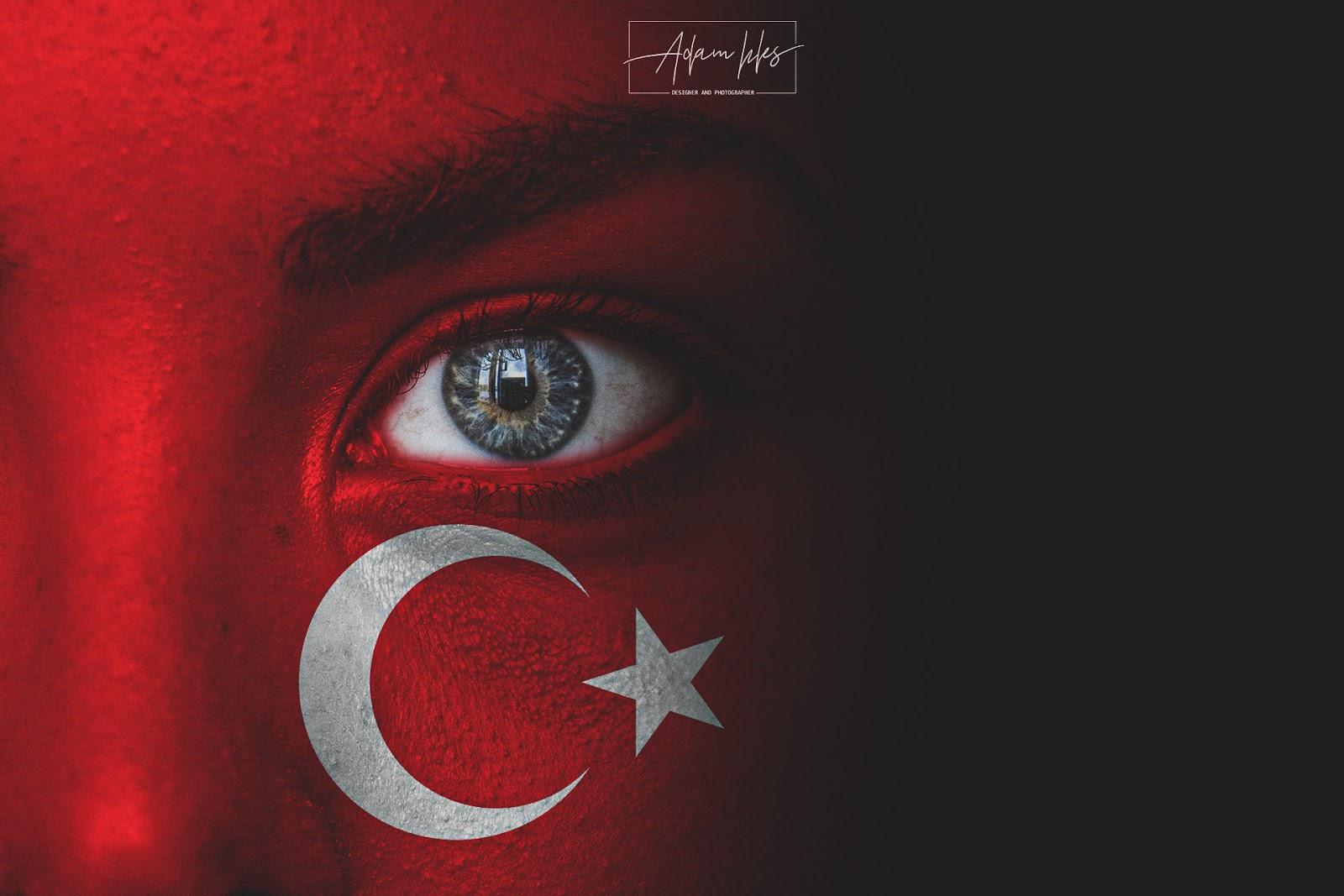1600x1067 Photo of the flag of Turkey on the face of a Child background