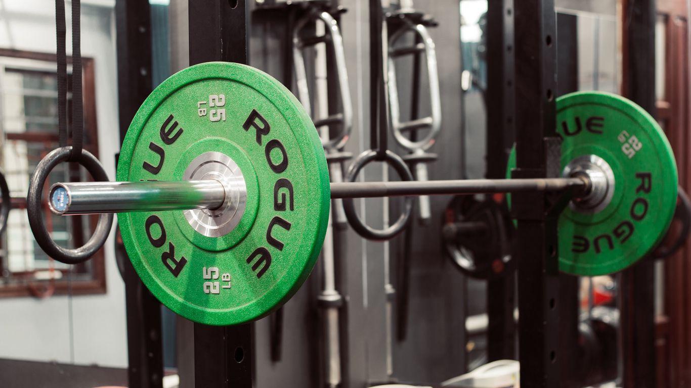 1366x768 Download wallpaper 1366x768 barbell, gym, sport, green tablet, laptop HD background