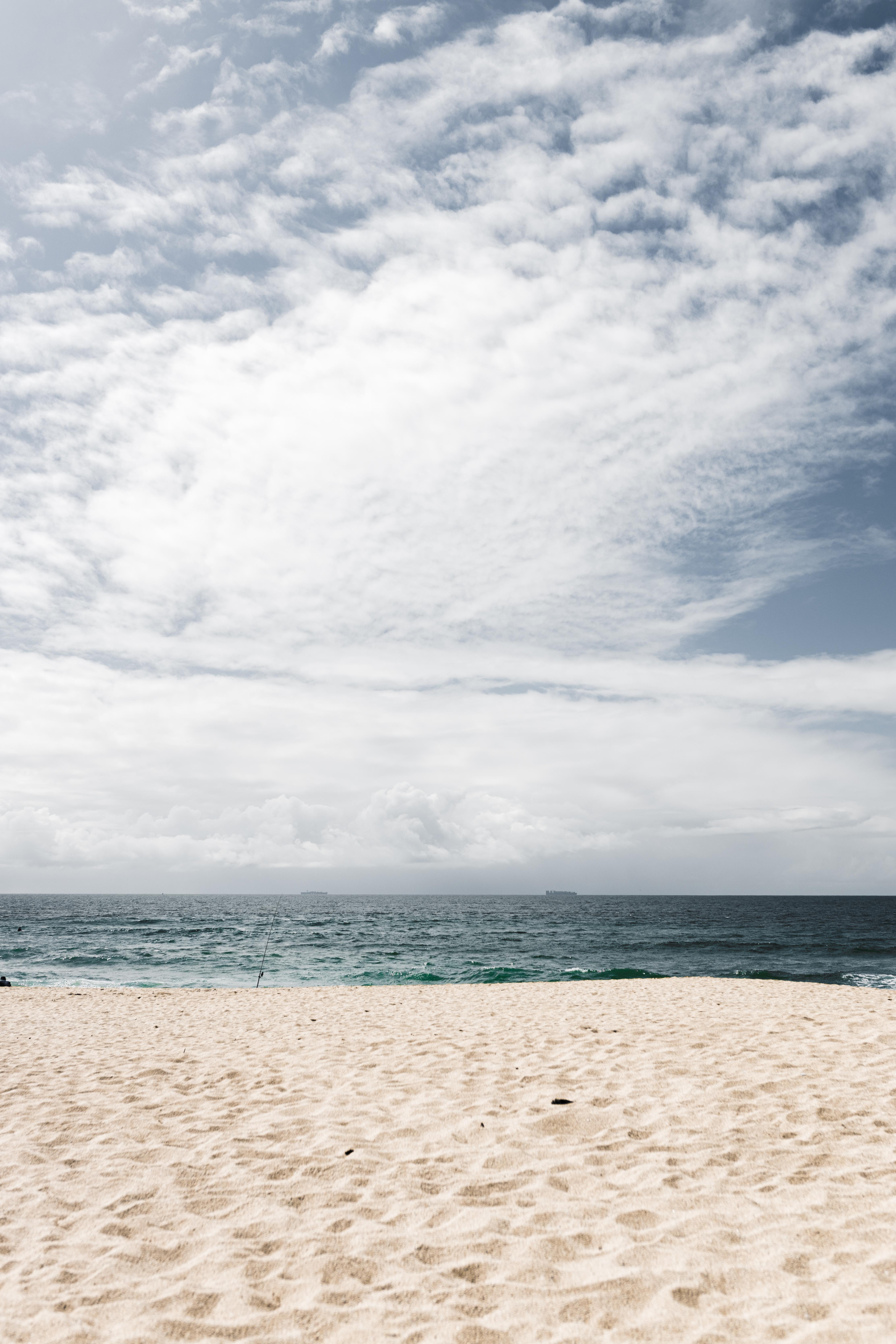 4449x6673 White Sand Beach Under White Clouds and Blue Sky · Free