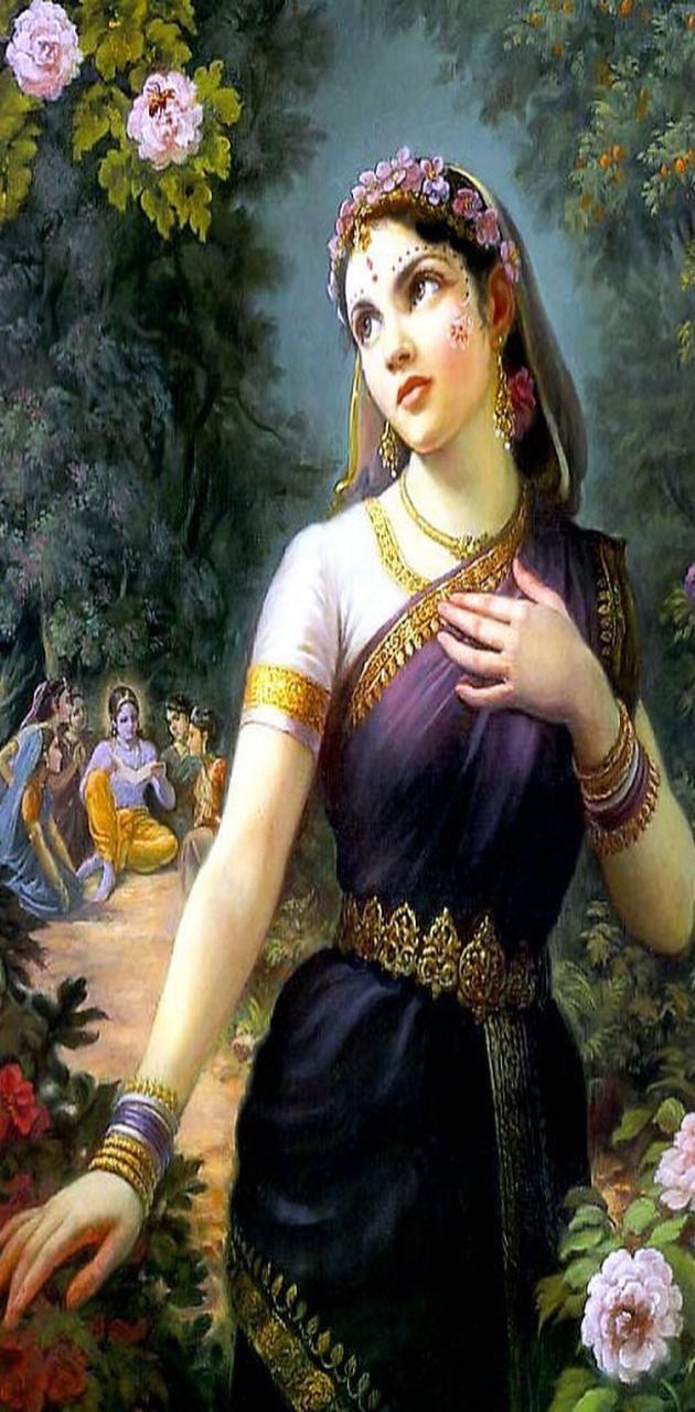 Download Krishna Ji And Radha In Gold Ensembles Wallpaper | Wallpapers.com