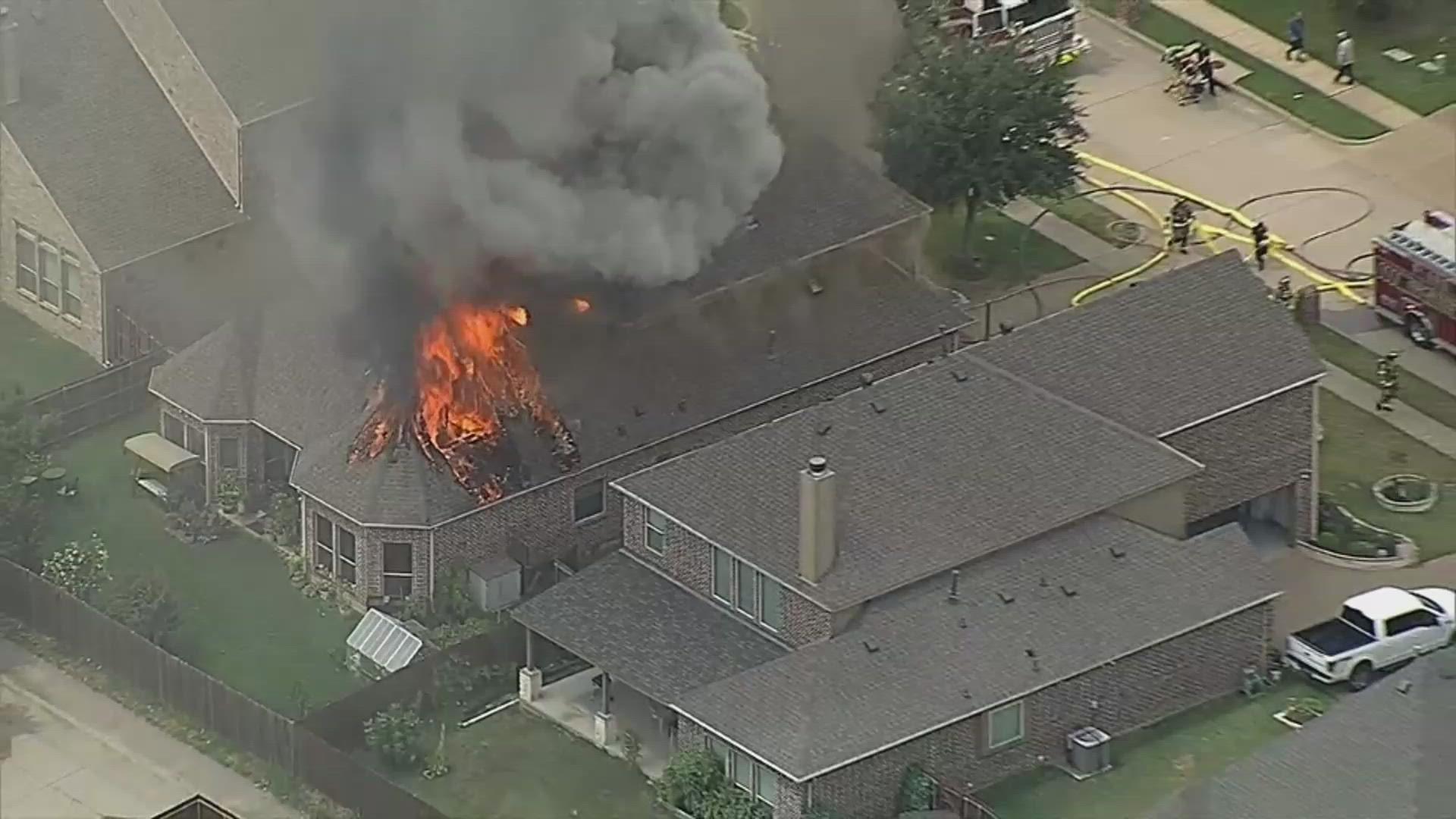 1920x1080 Fire crews battle a house fire in Plano