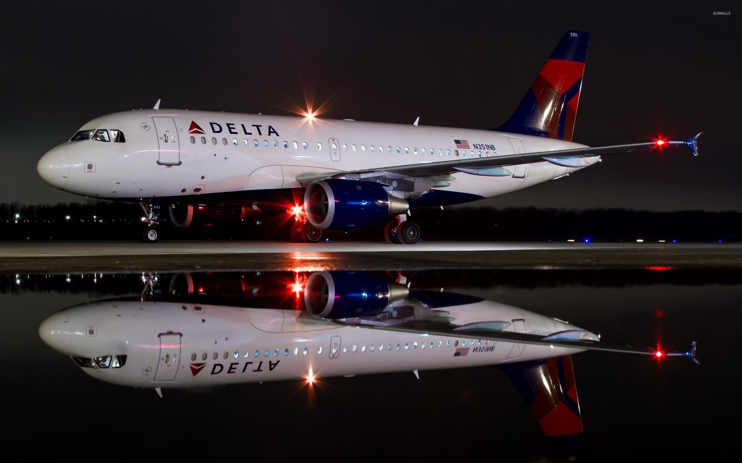 2560x1600 Delta Airbus A319 at night wallpaper wallpaper