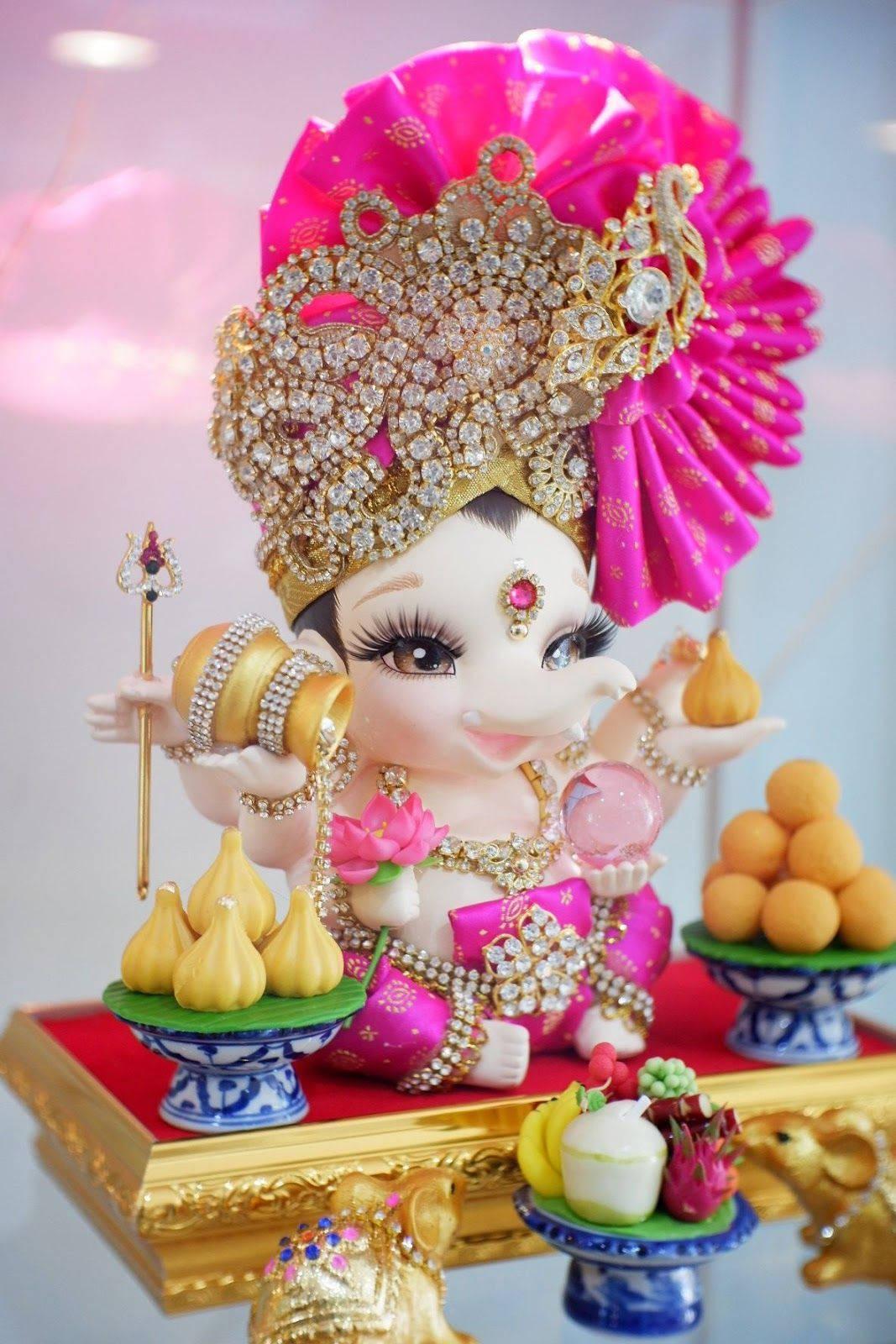 1067x1600 Download Baby Ganesh Food Offerings Wallpaper