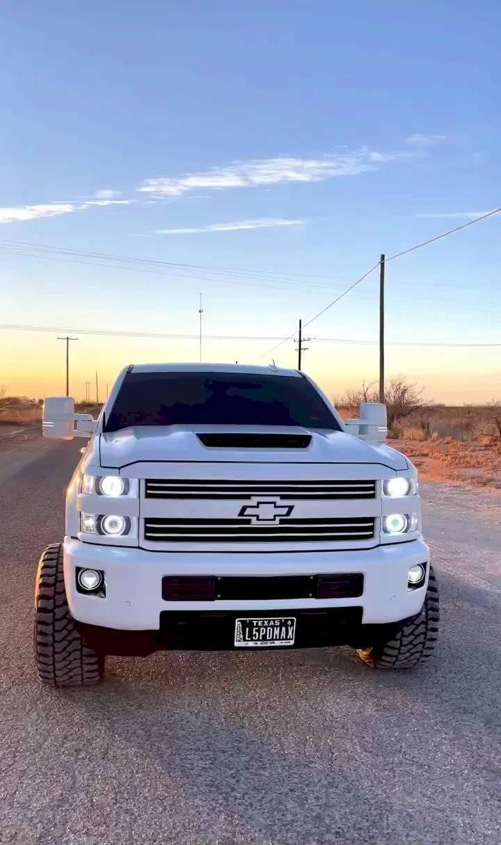 720x1214 Download Brilliant White Duramax Car Wallpaper