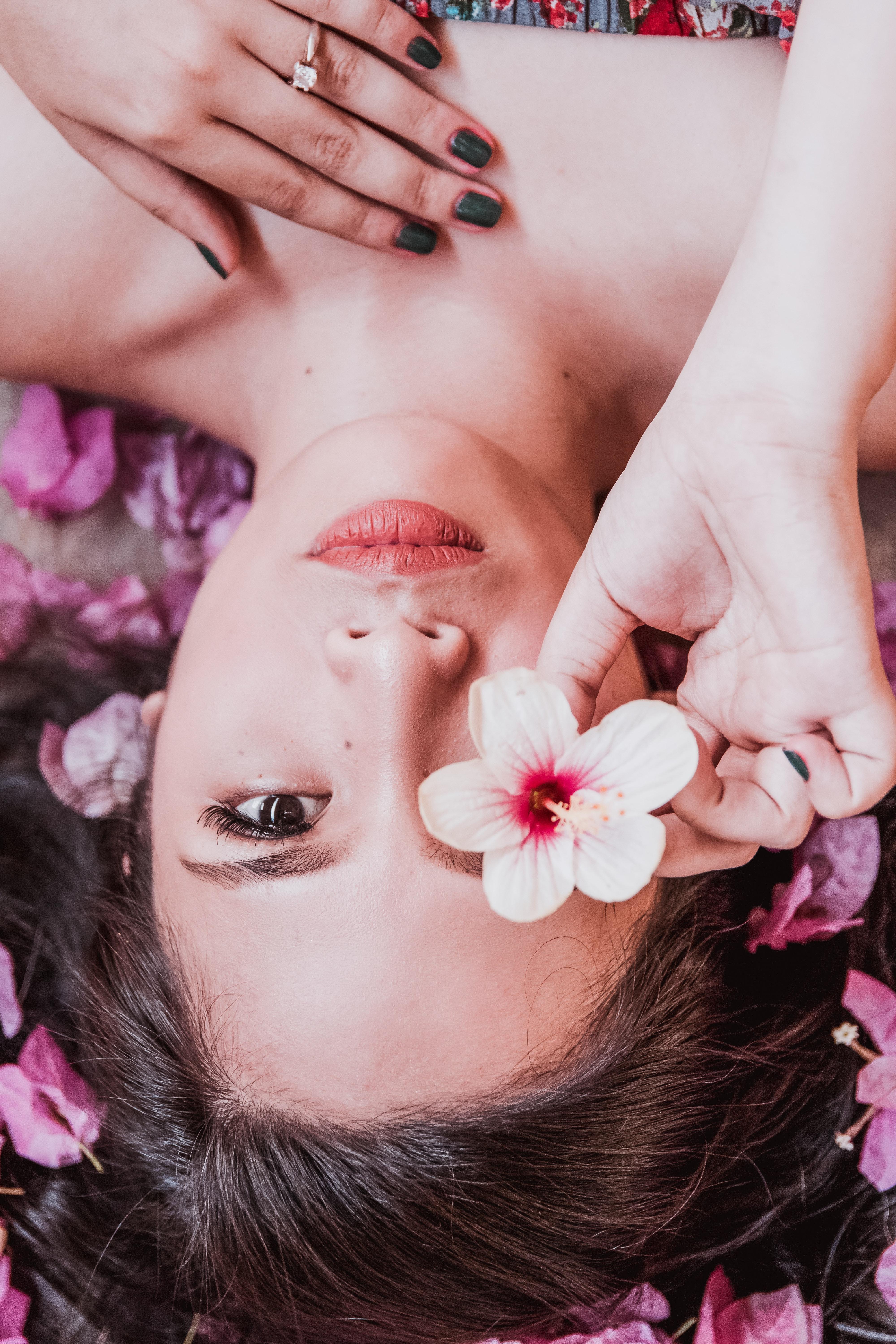4000x6000 Photo of Woman Holding Pink Flower · Free